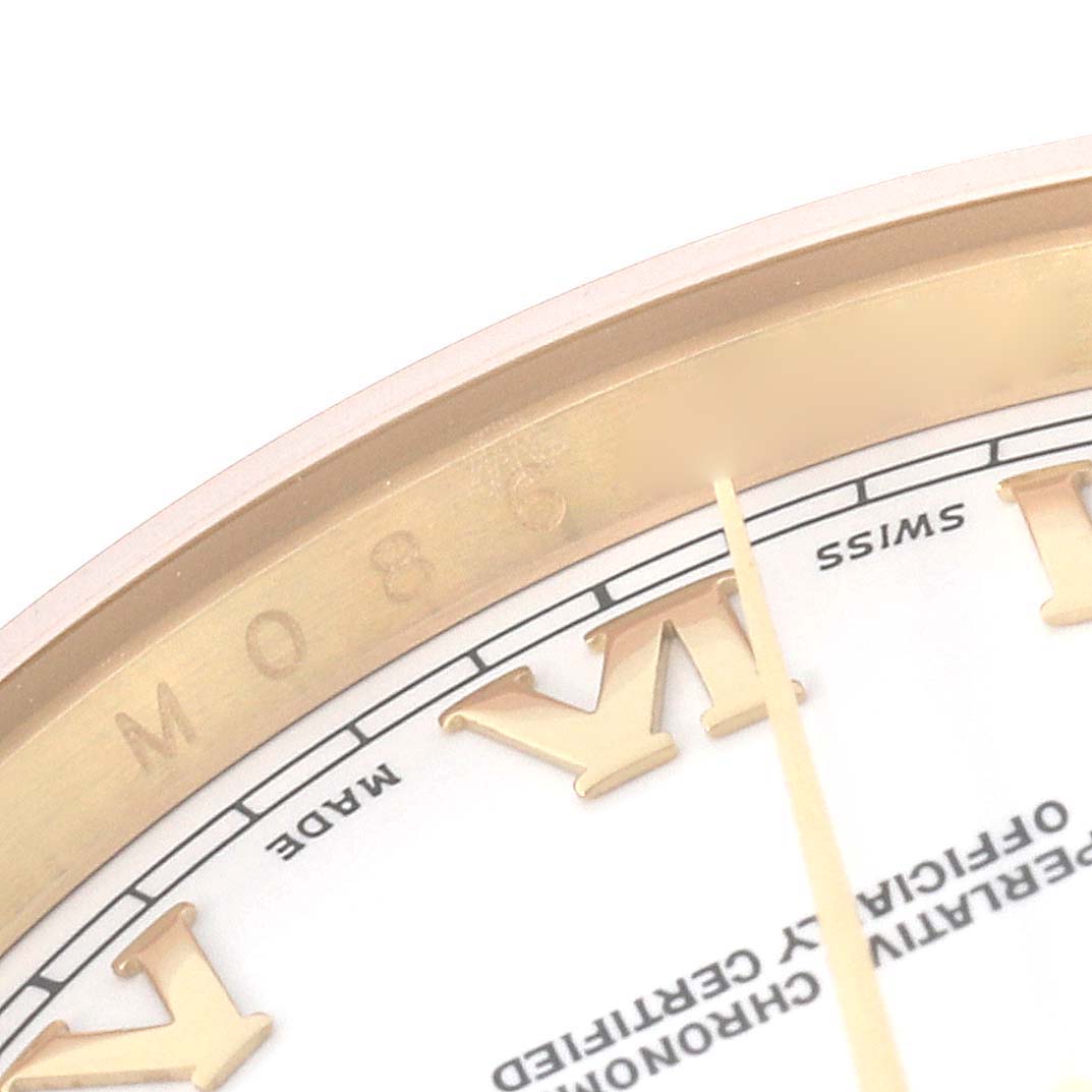 Close-up at an angle shows the dial and bezel of a Rolex President 118238 Men's Yellow Gold White Dial 118238 Men's Yellow Gold White Dial model, highlighting Roman numerals and "Swiss Made" labeling.