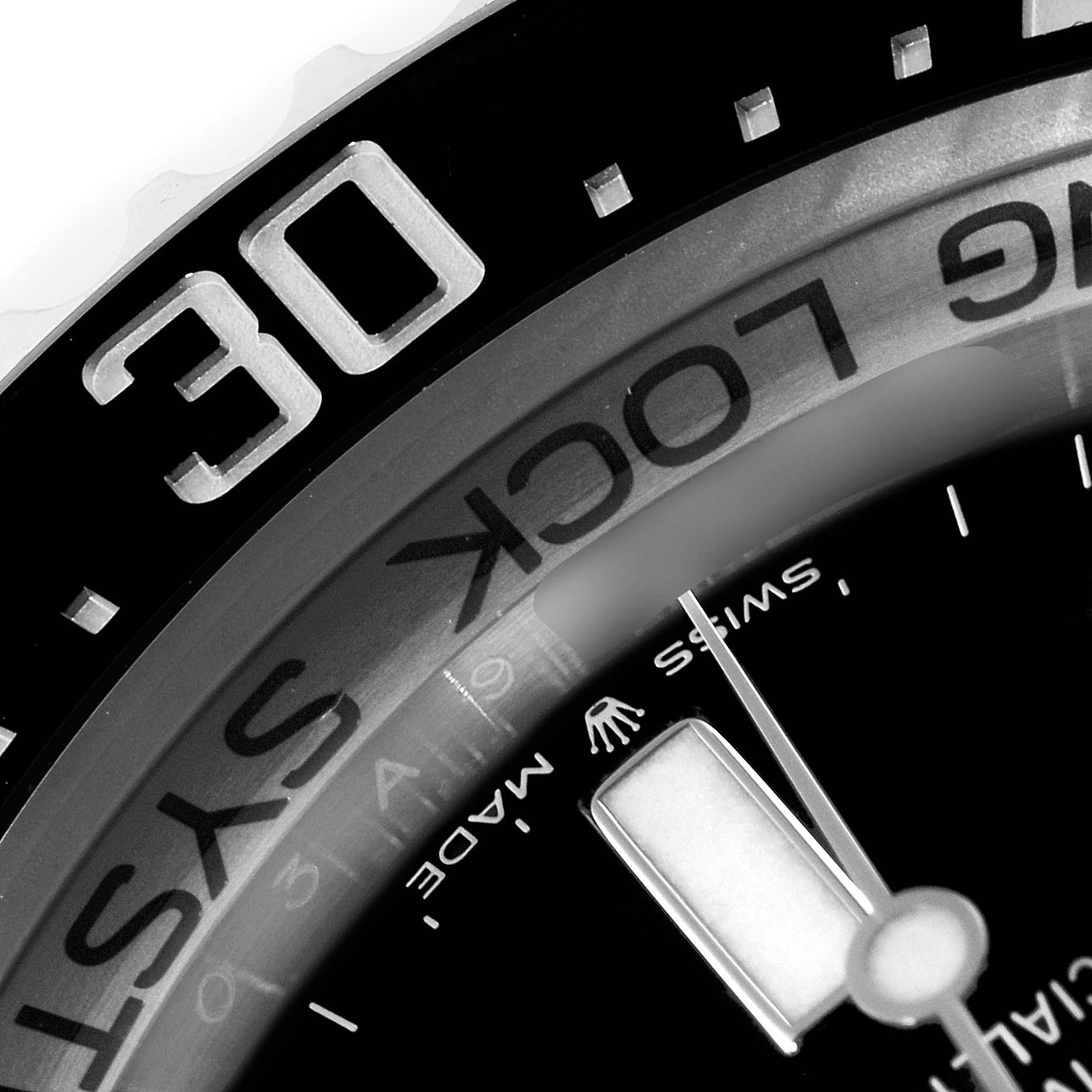 This image shows a close-up of a Rolex Sea-Dweller 126660 Men
s Stainless Steel Black Dial 126660 Men
s Stainless Steel Black Dial
s bezel and part of the dial, highlighting the "30" marker and "Ring Lock System" text.