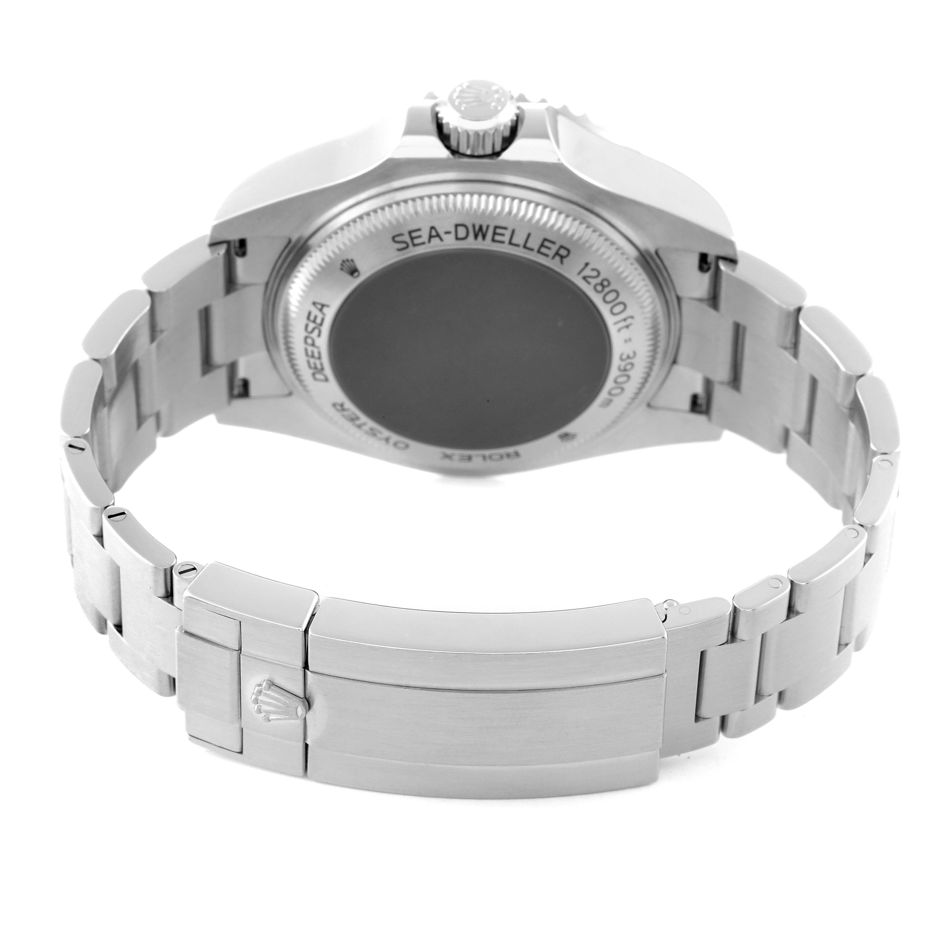 The image shows the backside and bracelet clasp of a Rolex Sea-Dweller 126660 Men's Stainless Steel Black Dial 126660 Men's Stainless Steel Black Dial watch.