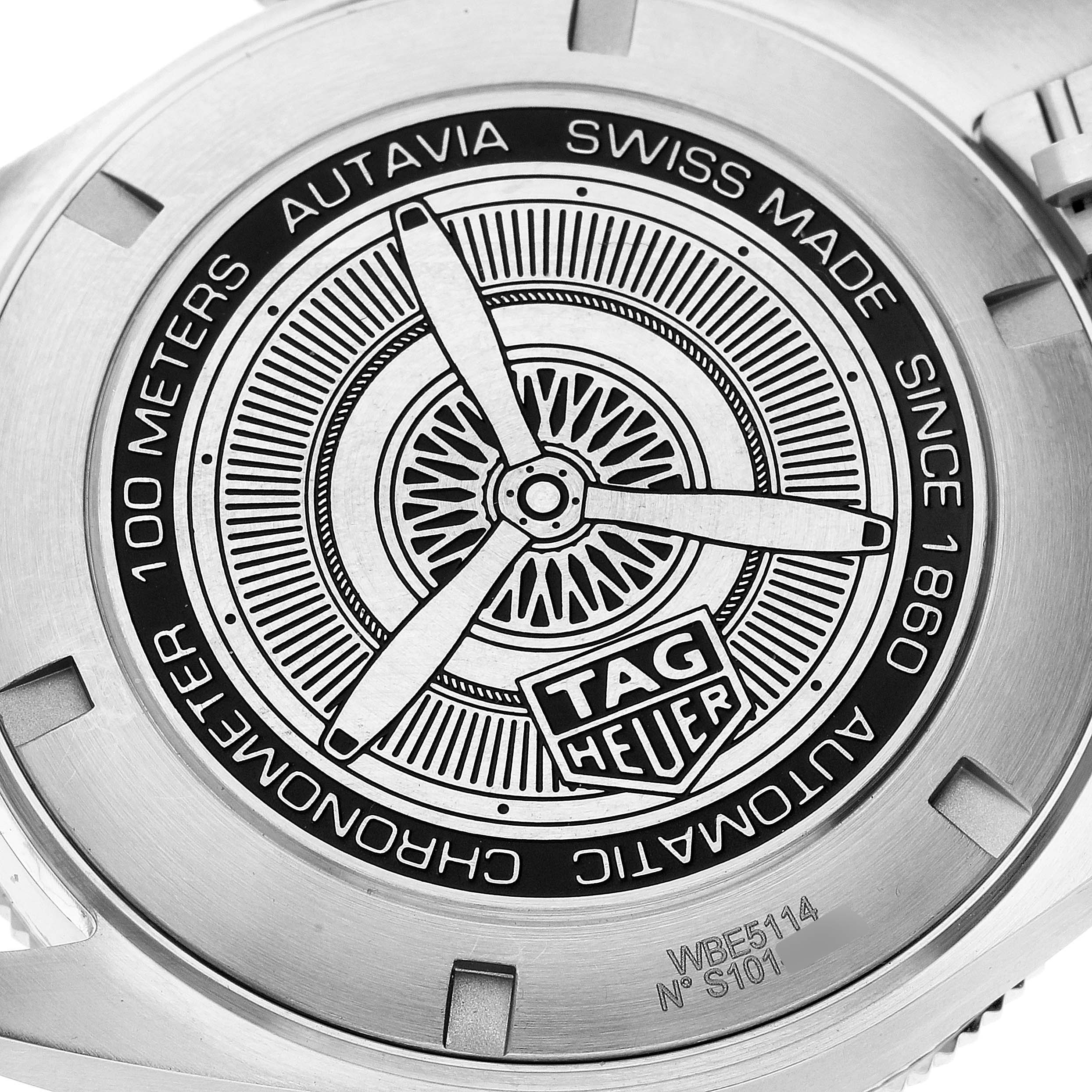 The image shows the back case of a Tag Heuer Autavia WBE5114.EB0173 Men's Stainless Steel Brown Dial WBE5114.EB0173 Men's Stainless Steel Brown Dial watch, featuring its branding and specifications.