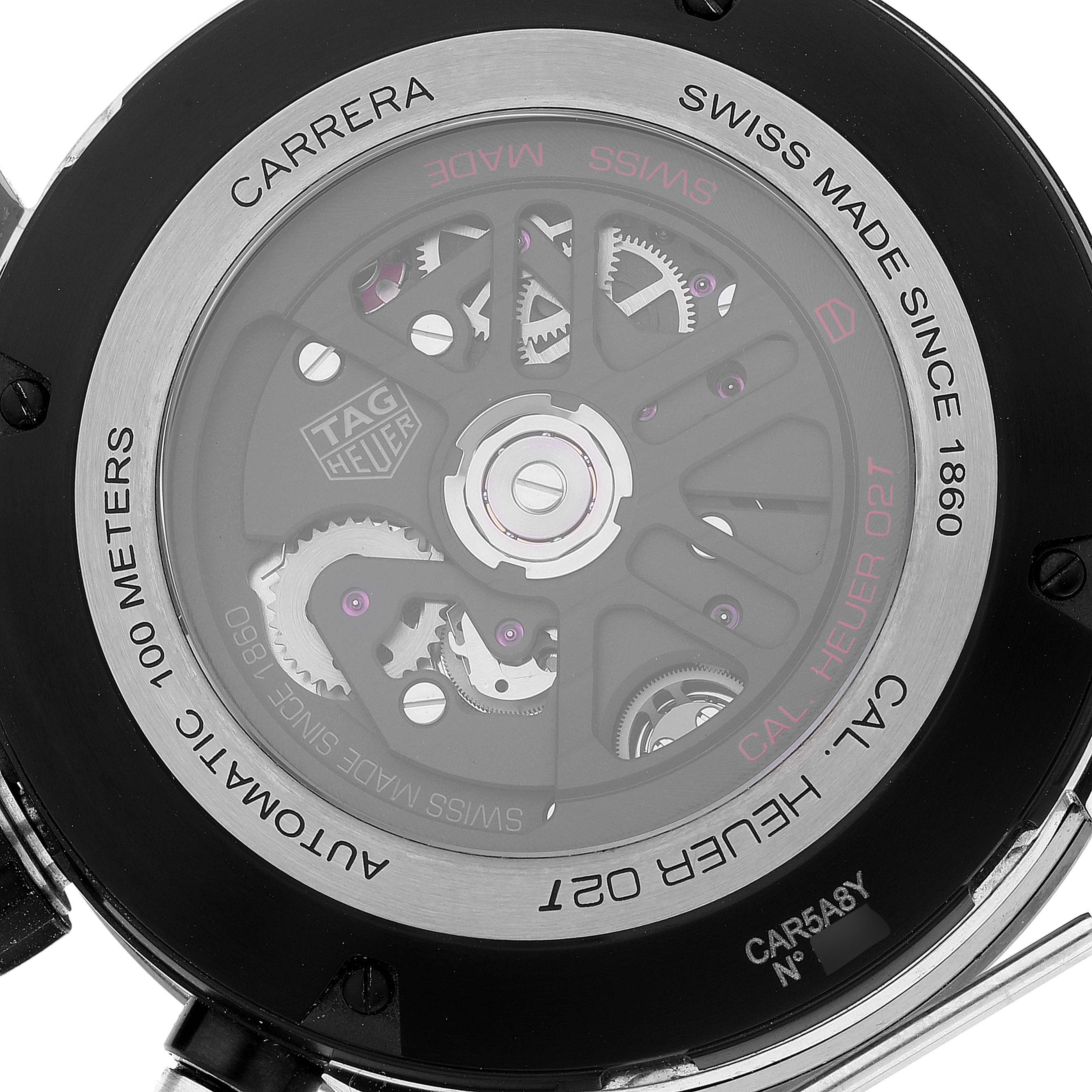 The image shows the back casing of a Tag Heuer Carrera CAR5A8Y.FC6377 Men's Titanium Black Dial CAR5A8Y.FC6377 Men's Titanium Black Dial watch, featuring the internal mechanics and inscriptions.