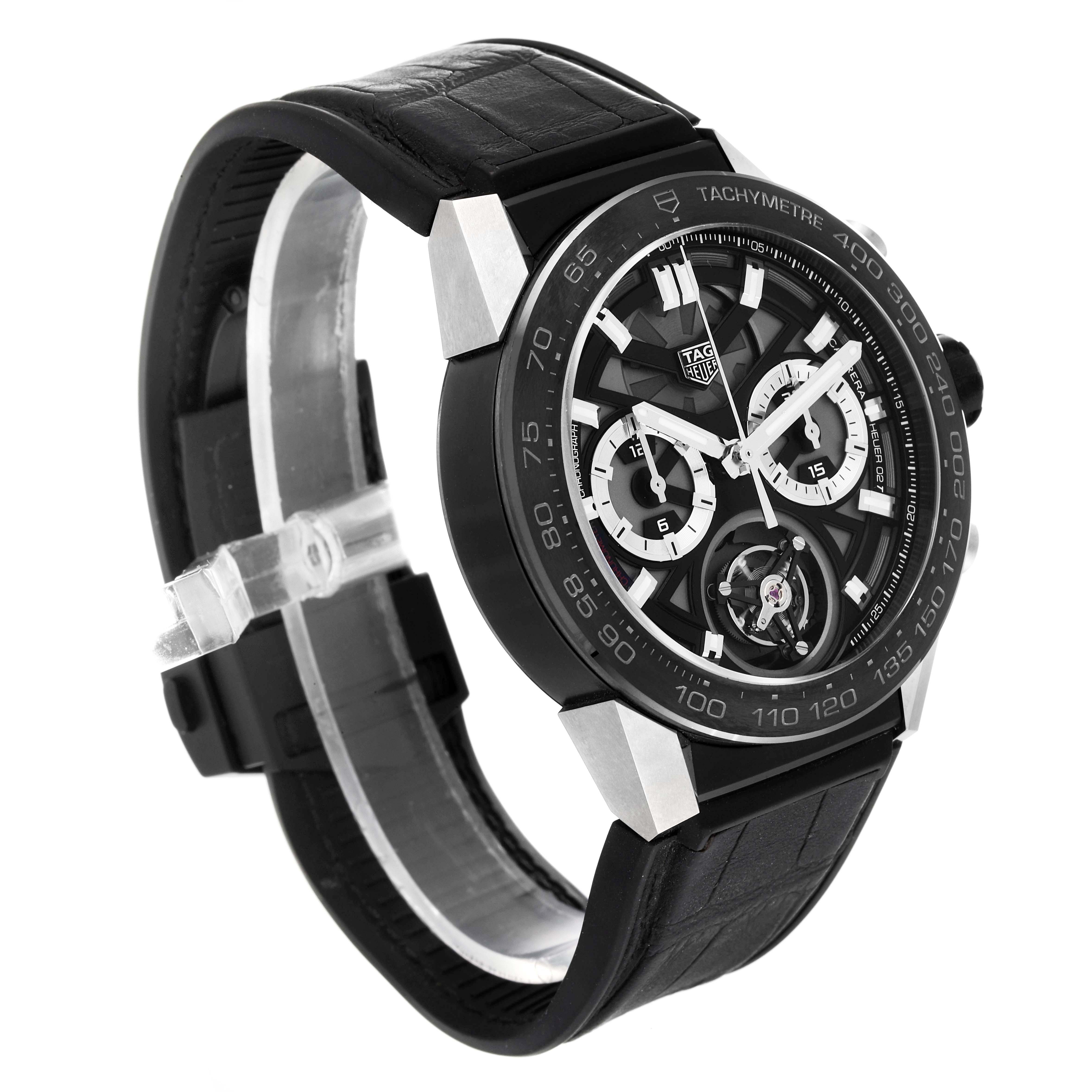 The image shows a side angle of the Tag Heuer Carrera CAR5A8Y.FC6377 Men's Titanium Black Dial CAR5A8Y.FC6377 Men's Titanium Black Dial watch, highlighting its black strap and detailed dial with tachymeter.