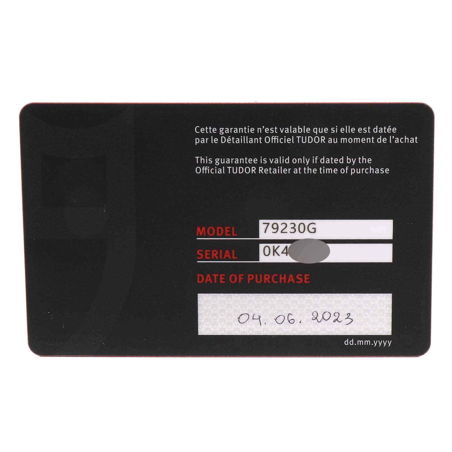 The image shows a warranty card for the Tudor Heritage Black Bay 79230G Men's Stainless Steel Black Dial 79230G Men's Stainless Steel Black Dial model 79230G, with details like model, serial number, and date of purchase.