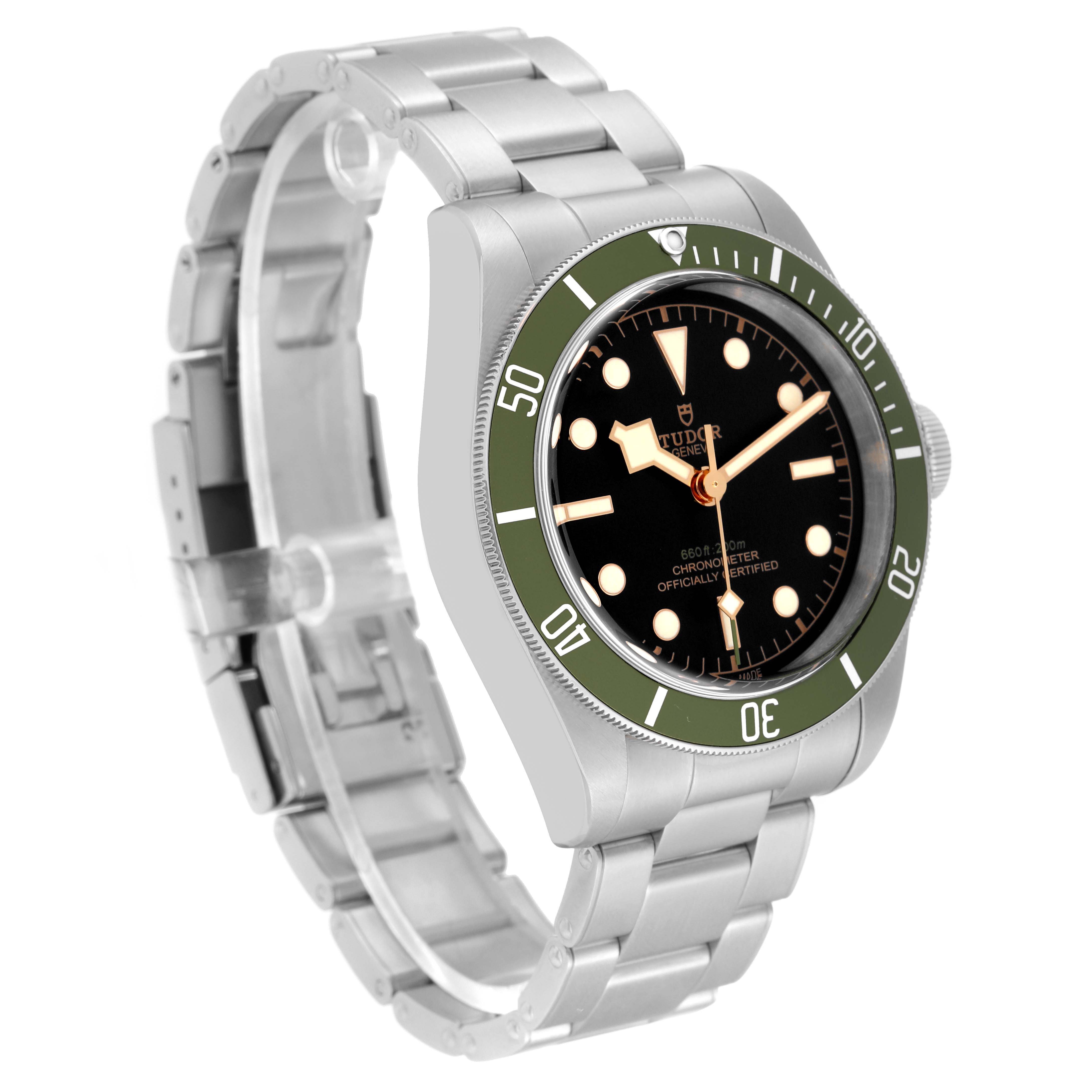 The Tudor Heritage Black Bay 79230G Men's Stainless Steel Black Dial 79230G Men's Stainless Steel Black Dial watch is shown at an angle displaying its dial, bezel, and stainless steel bracelet.