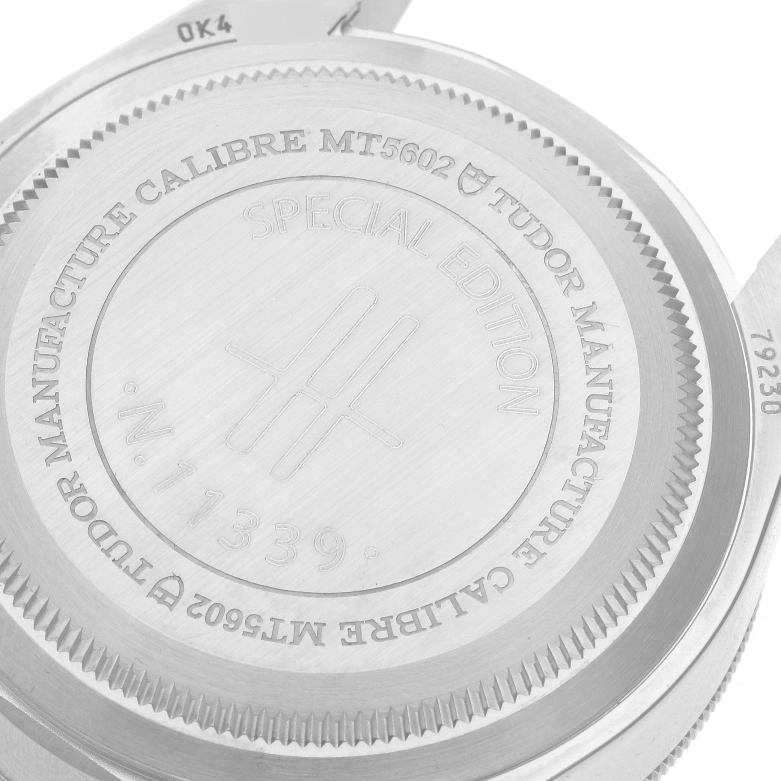 The image shows the back case of a Tudor Heritage Black Bay 79230G Men's Stainless Steel Black Dial 79230G Men's Stainless Steel Black Dial watch, displaying the model, special edition number, and branding.