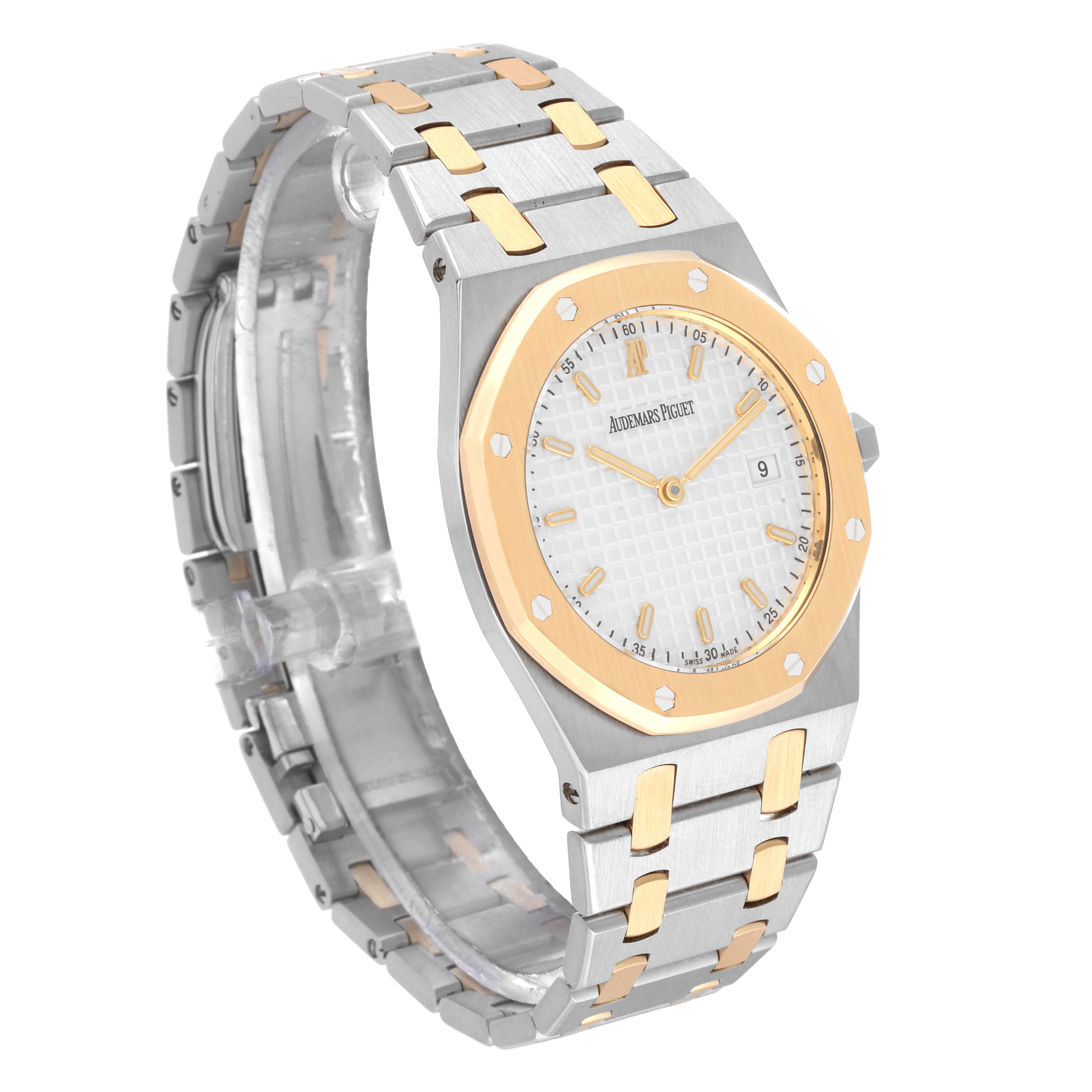 The image shows an angled view of the Audemars Piguet Royal Oak 57175SA.OO.0789SA.01 Men's Steel and Gold (two tone) White Dial 57175SA.OO.0789SA.01 Men's Steel and Gold (two tone) White Dial watch, highlighting its two-tone bracelet and octagonal bezel.