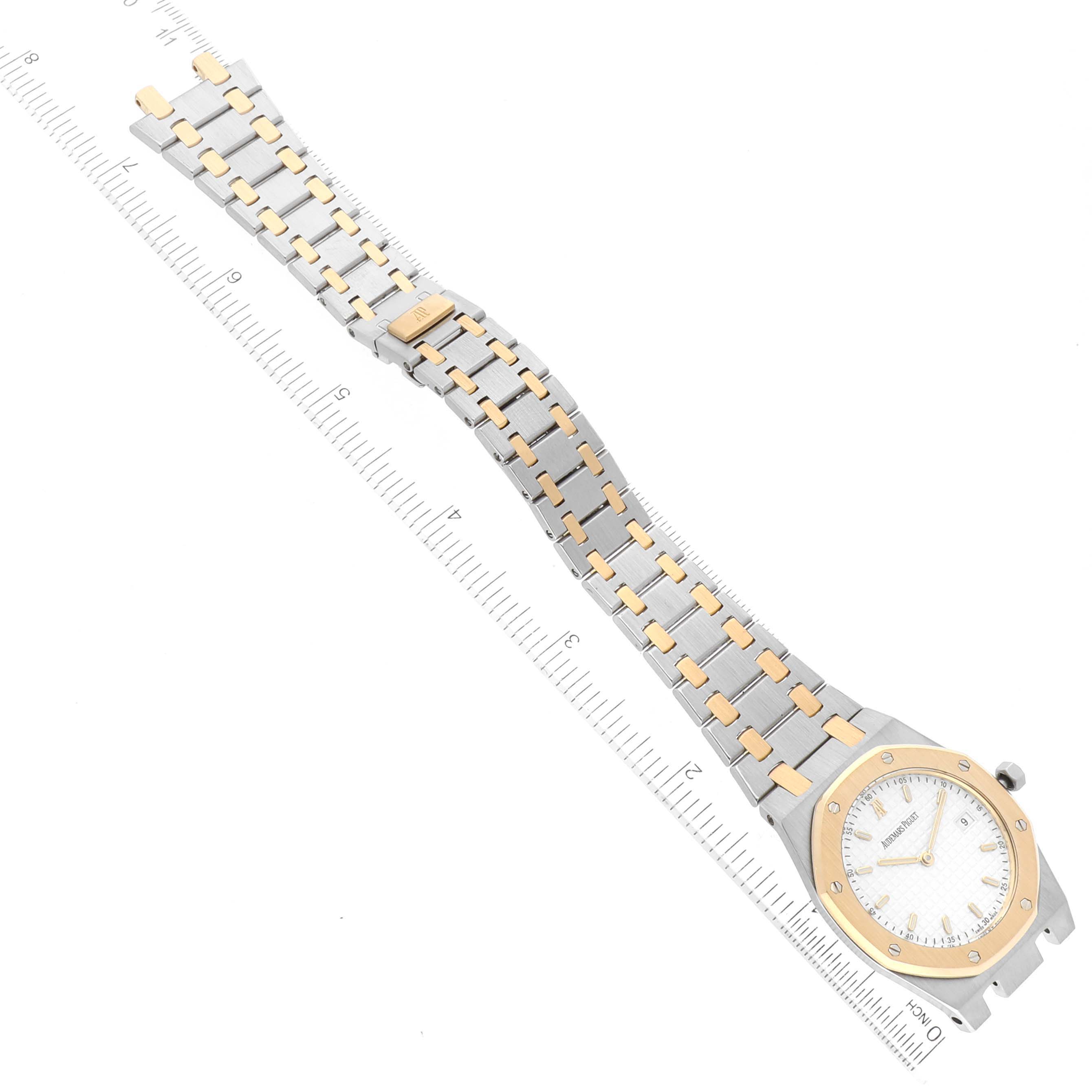 The image shows a top-down view of a Royal Oak watch by Audemars Piguet, including the face, bezel, and stainless steel bracelet.