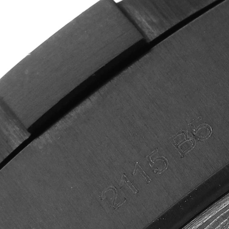 This close-up image shows a segment of the metal band with engraved numbers of the Breitling Avenger V173111 Men's Titanium Black Dial V173111 Men's Titanium Black Dial watch.