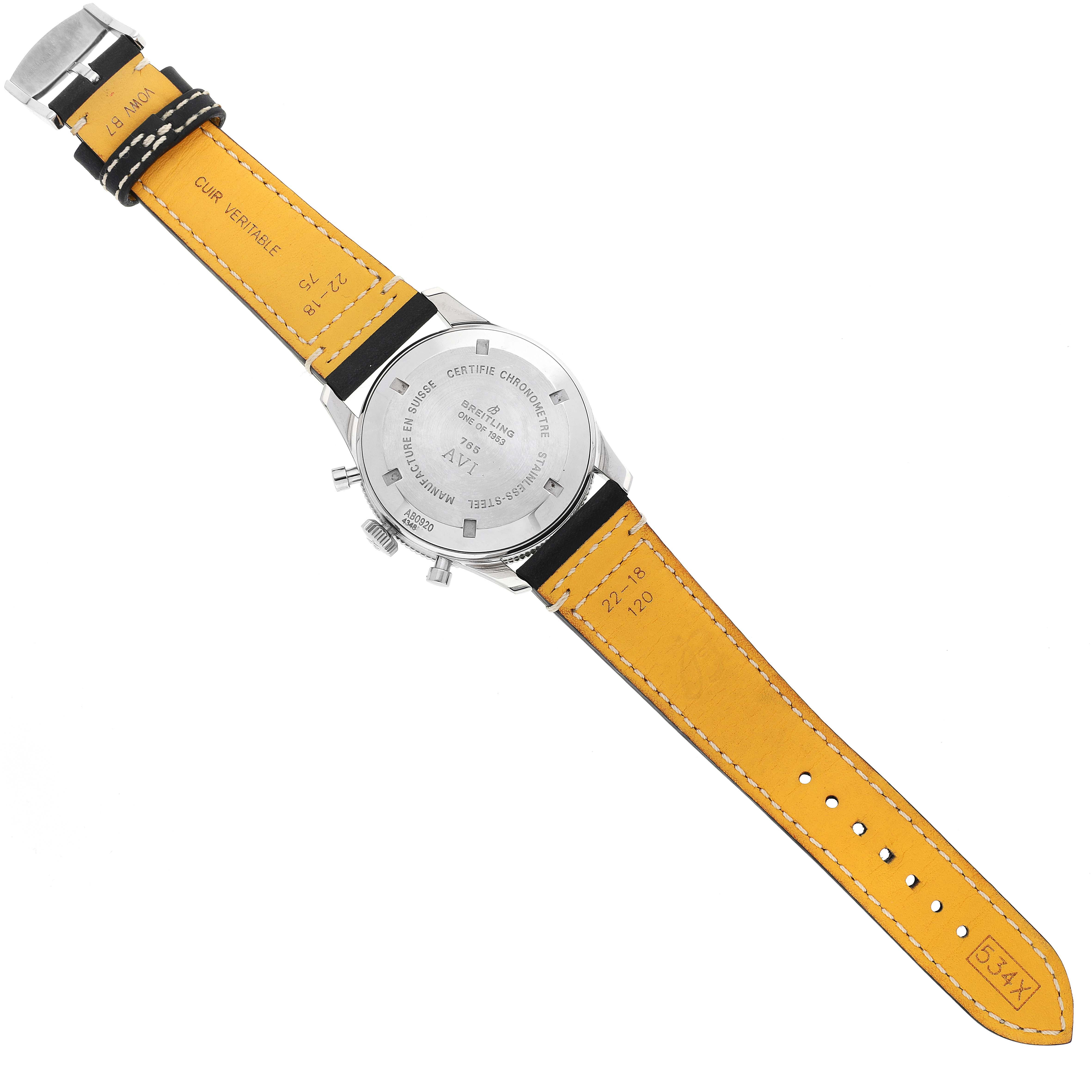 The image shows the back view of a Breitling Navitimer watch, highlighting its case back and leather strap.