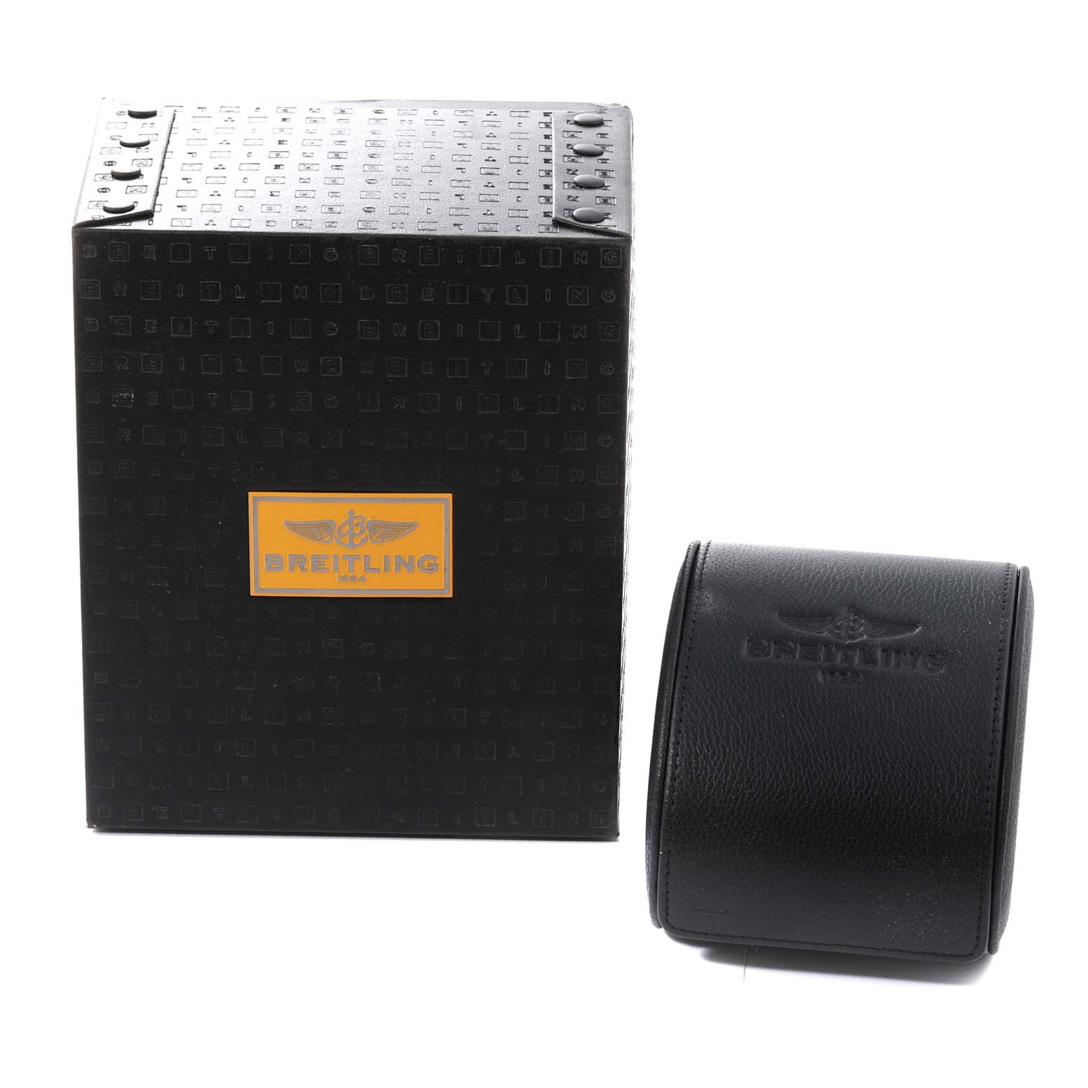 The image shows a Breitling Navitimer watch box and a black leather watch pouch, both with the Breitling logo.