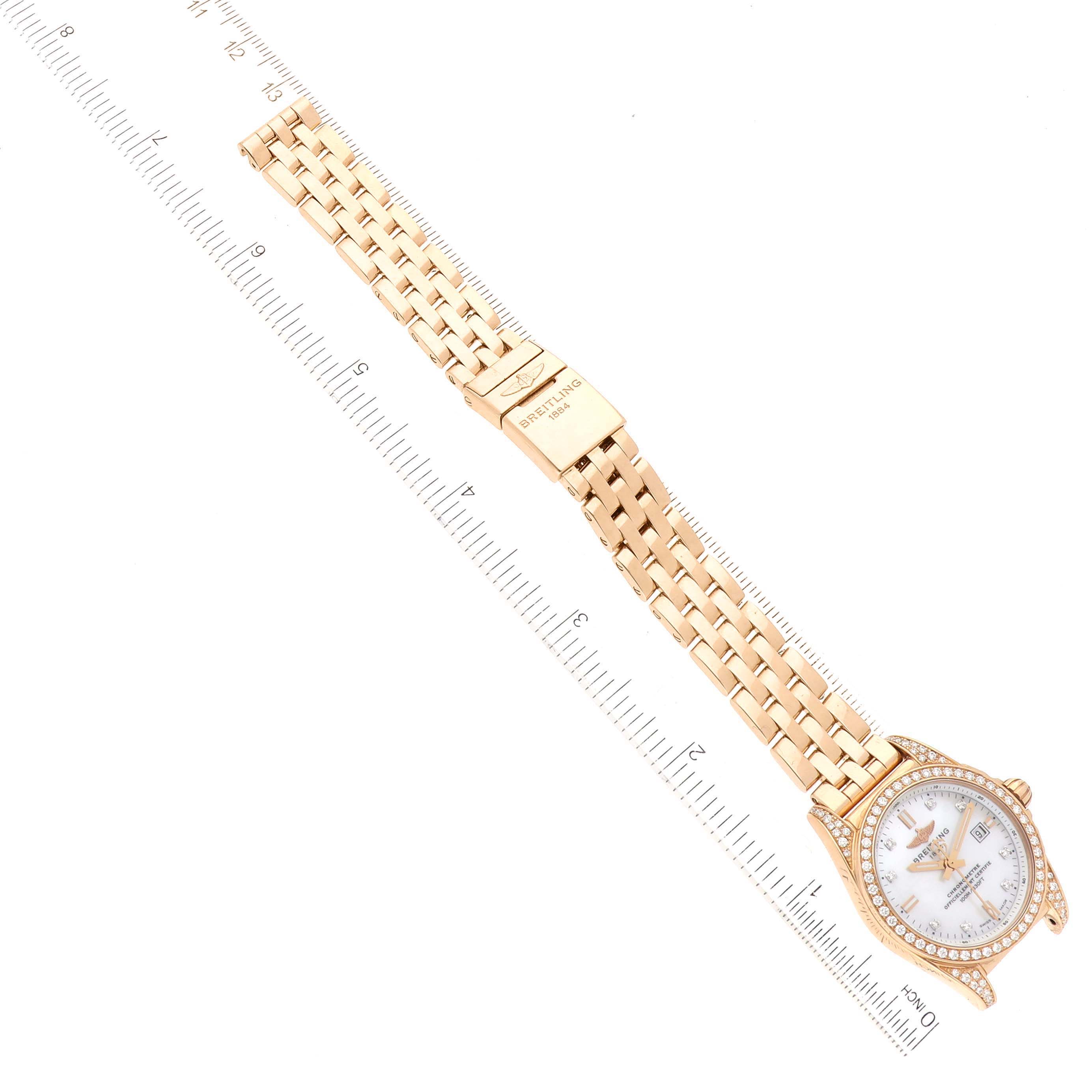 This image shows the Breitling H72348 Women's Rose Gold Mother of Pearl Dial H72348 Women's Rose Gold Mother of Pearl Dial Galactic 29 H72348 watch flat, showcasing the gold bracelet, diamond bezel, and mother-of-pearl dial.