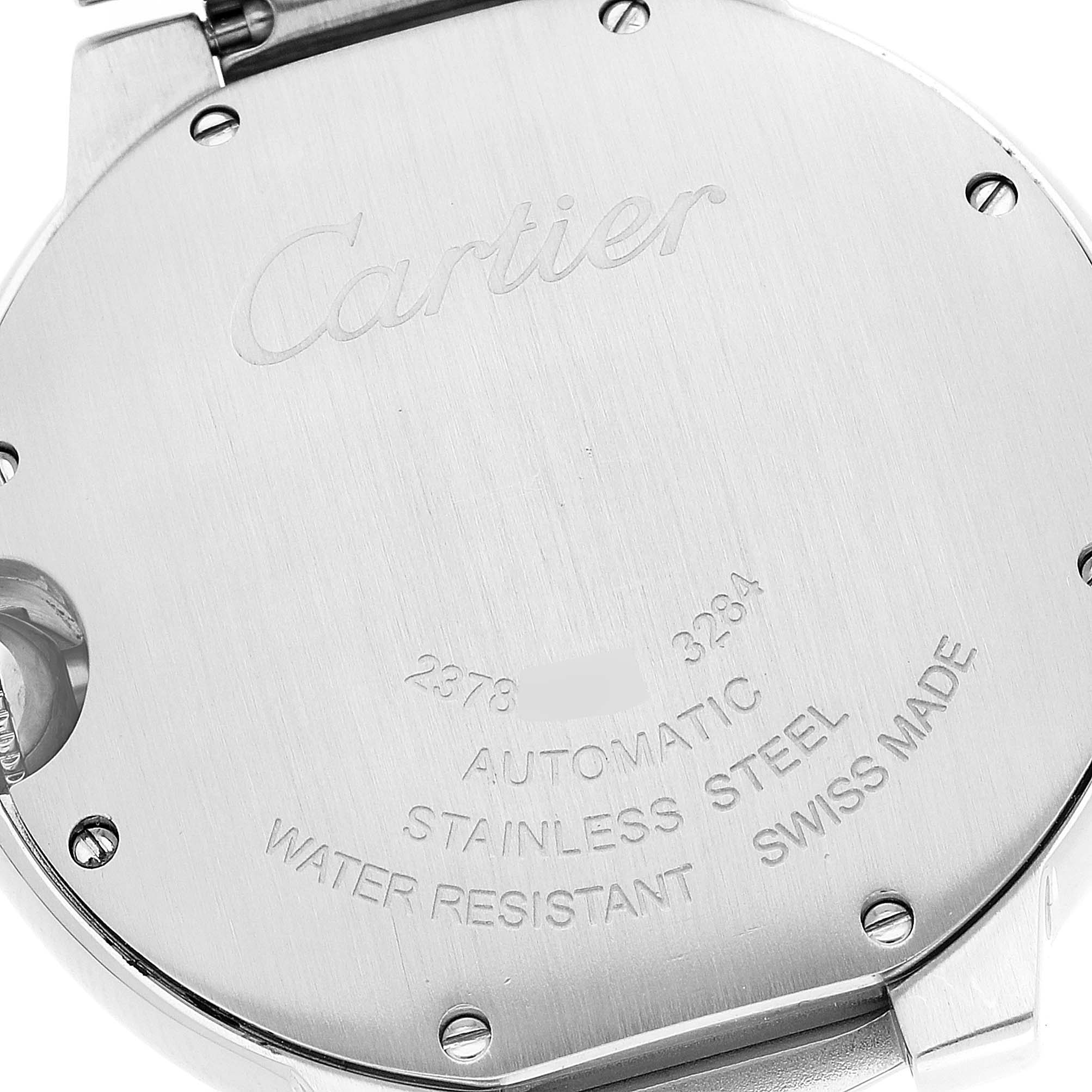 The image shows the back case of a Cartier Ballon Bleu W6920046 Women
s Stainless Steel Silver Dial W6920046 Women
s Stainless Steel Silver Dial watch, highlighting its inscriptions and stainless steel construction.