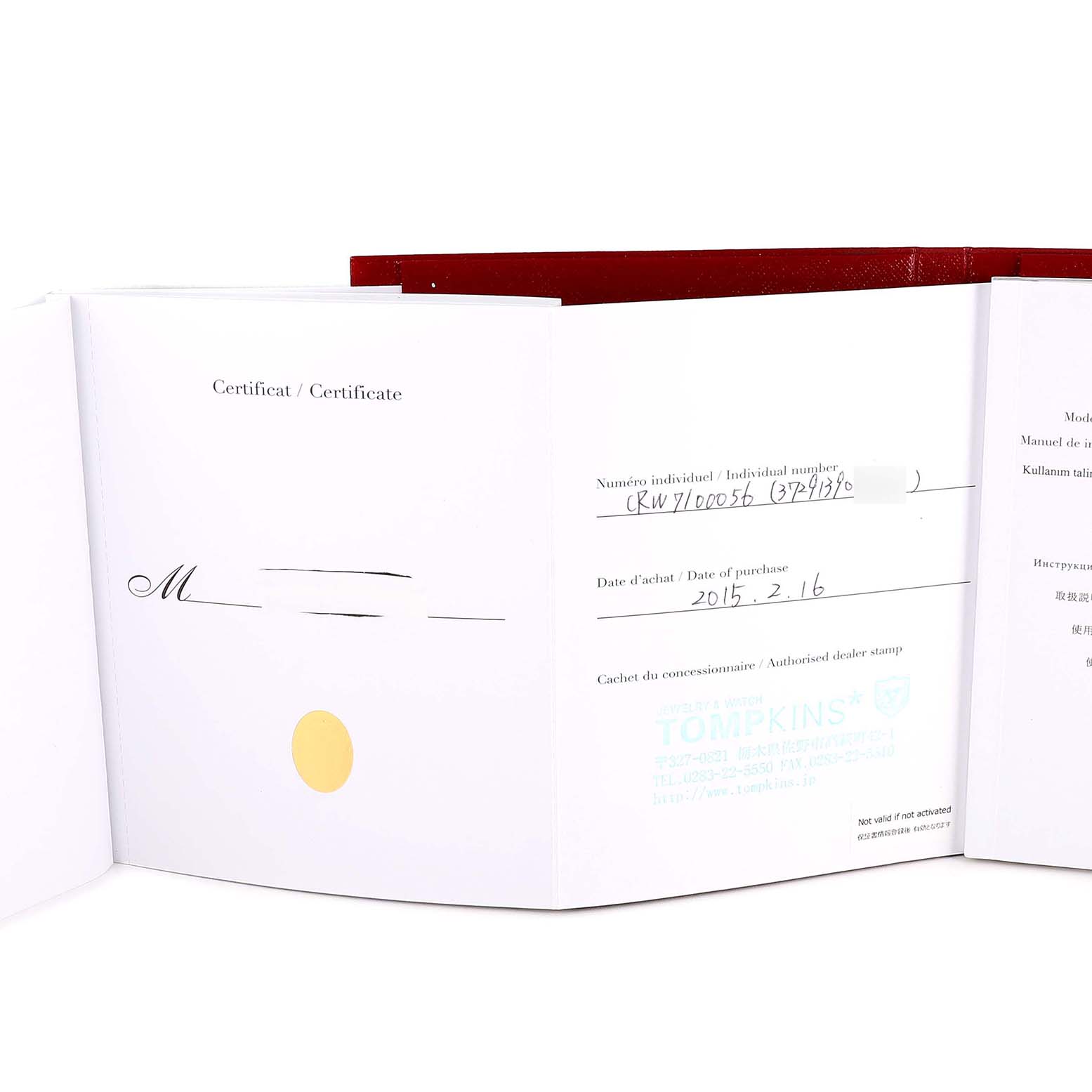 This image shows the certificate and warranty documents for a Calibre de Cartier watch by Cartier.