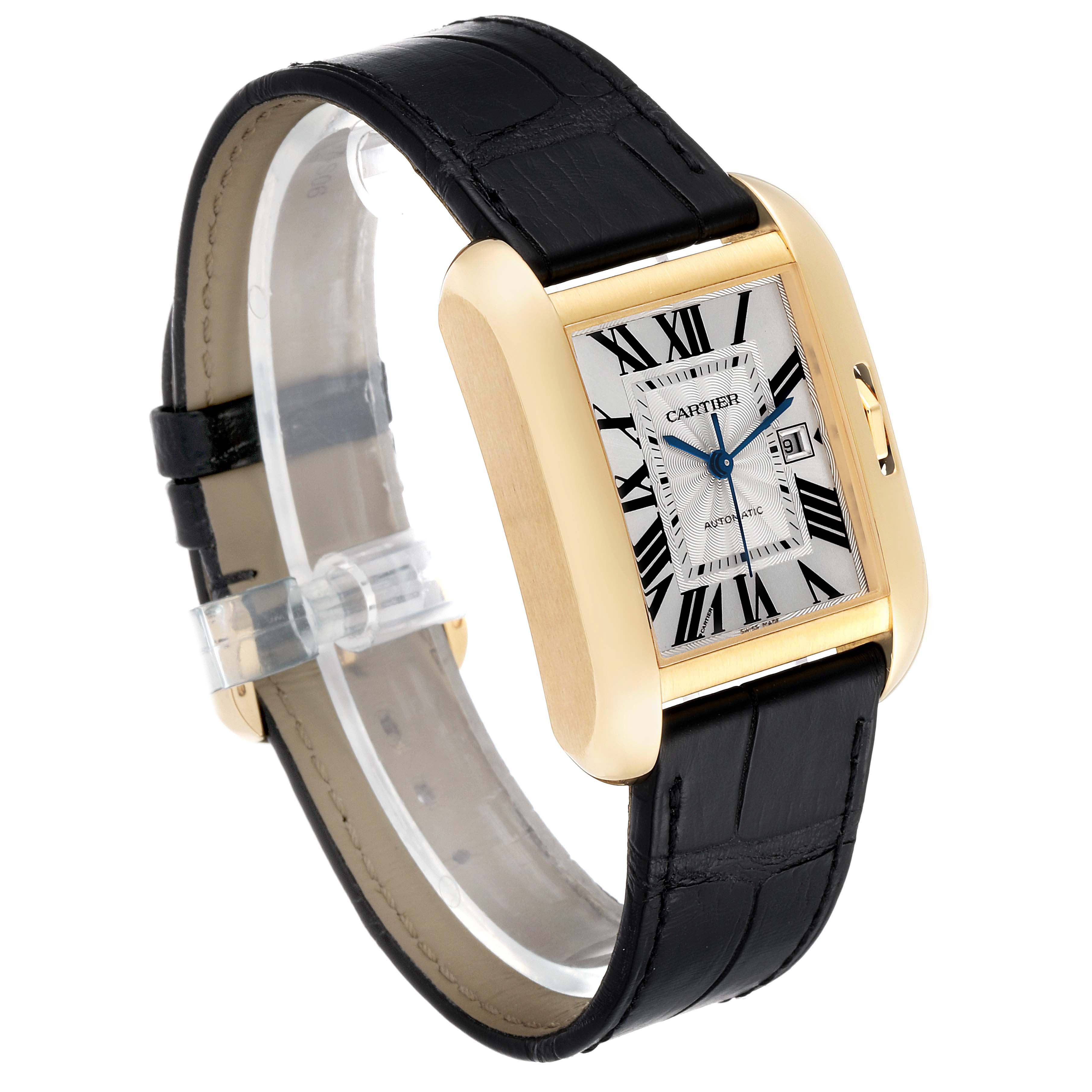 The image shows a Cartier Tank Anglaise W5310030 Men's Yellow Gold Silver Dial W5310030 Men's Yellow Gold Silver Dial watch at a tilted angle, highlighting its rectangular dial, gold case, and black leather strap.