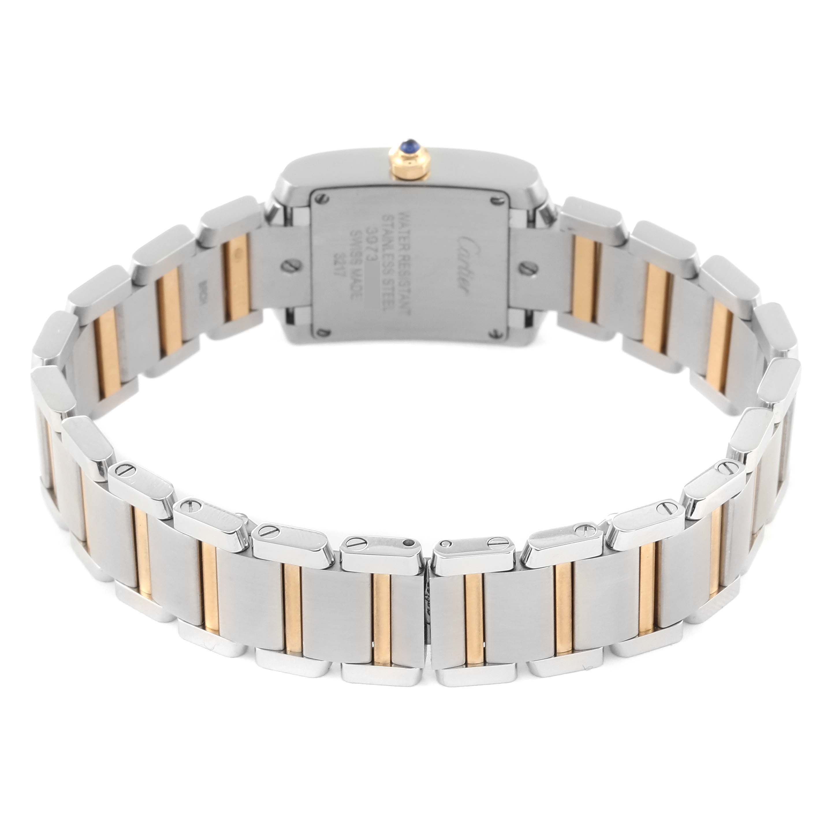The image shows a Cartier Tank Française watch from the back, highlighting its two-tone metal bracelet and case back details.