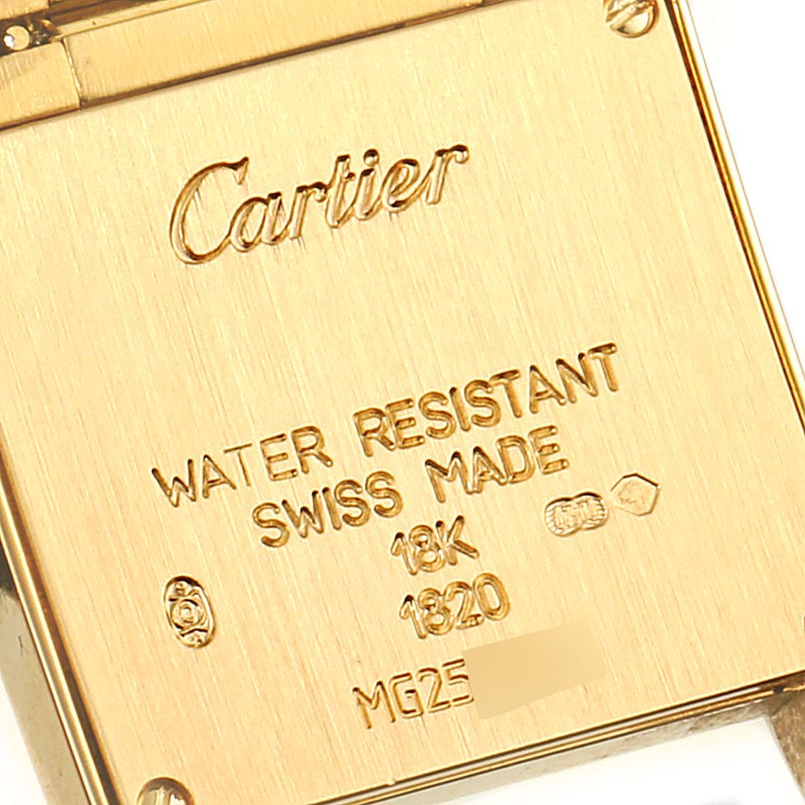 This image shows the back case of a Cartier Tank Francaise W50002N2 Women's Yellow Gold Silver Dial W50002N2 Women's Yellow Gold Silver Dial watch, highlighting engravings and hallmarks.