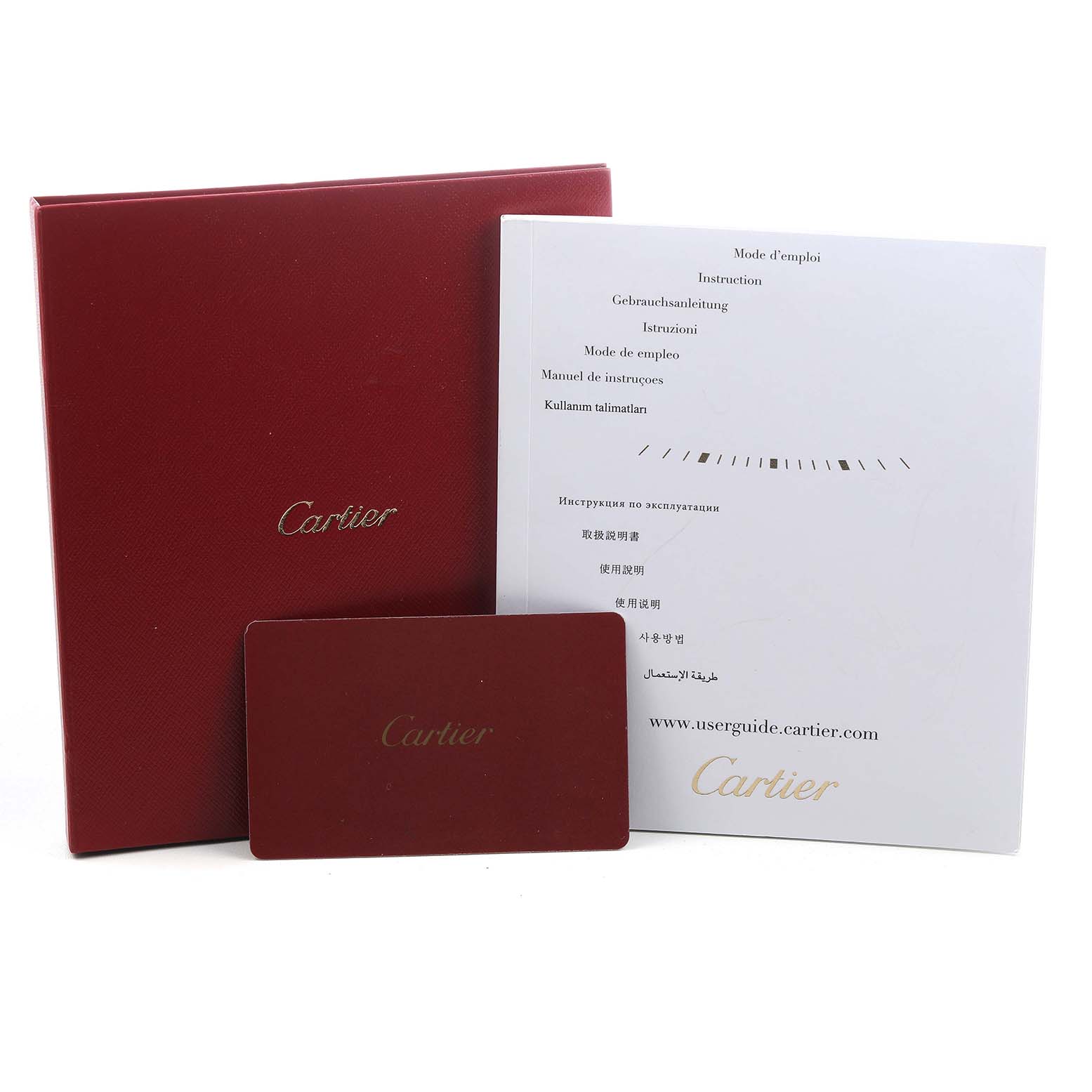 The image shows the packaging, manual, and card for a Cartier Tank Solo WSTA0030 Women's Stainless Steel Silver Dial watch, with the box and documents prominently displayed.