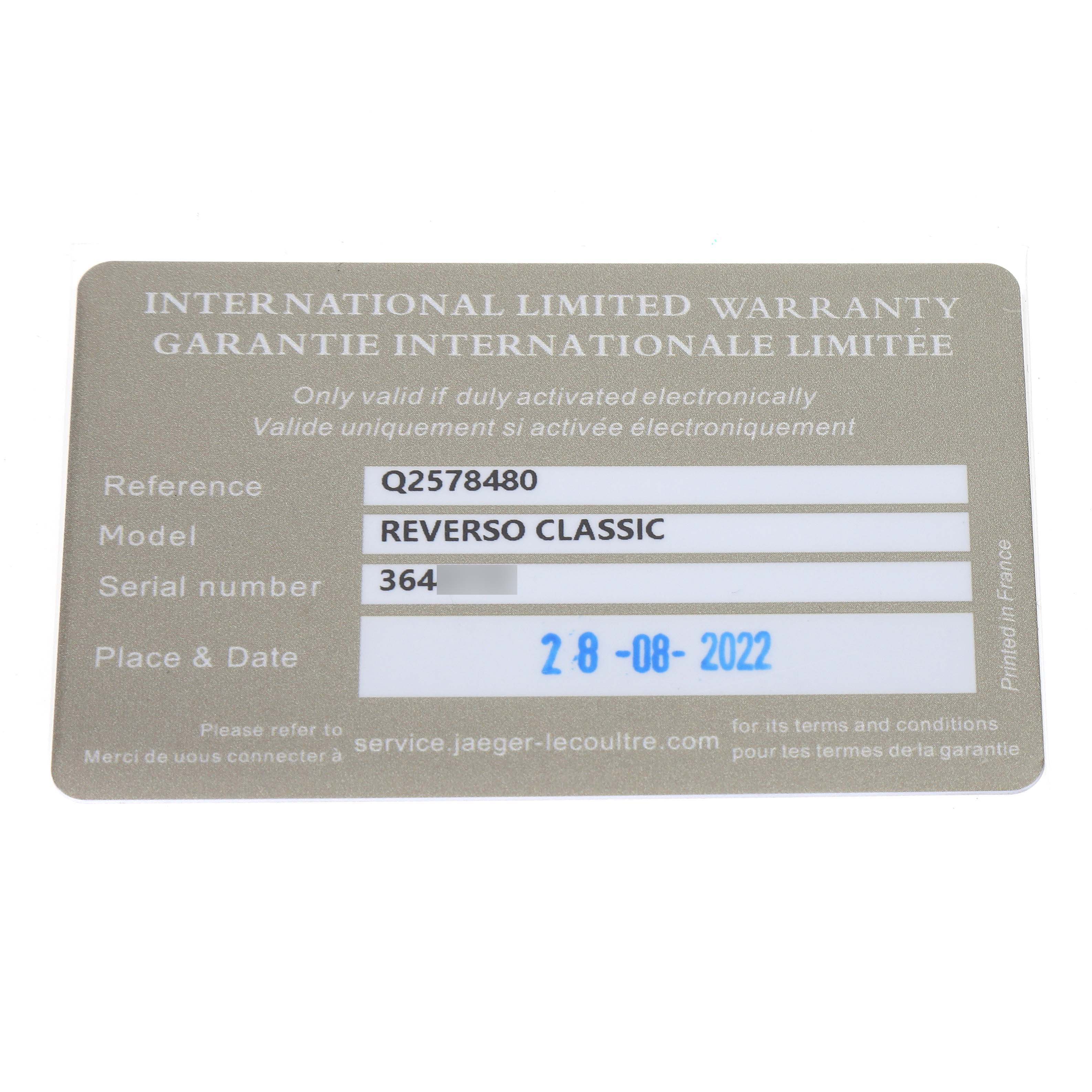 The image shows an international limited warranty card for the Jaeger LeCoultre Reverso Q2578480 Women's Stainless Steel Blue Dial Classic model.