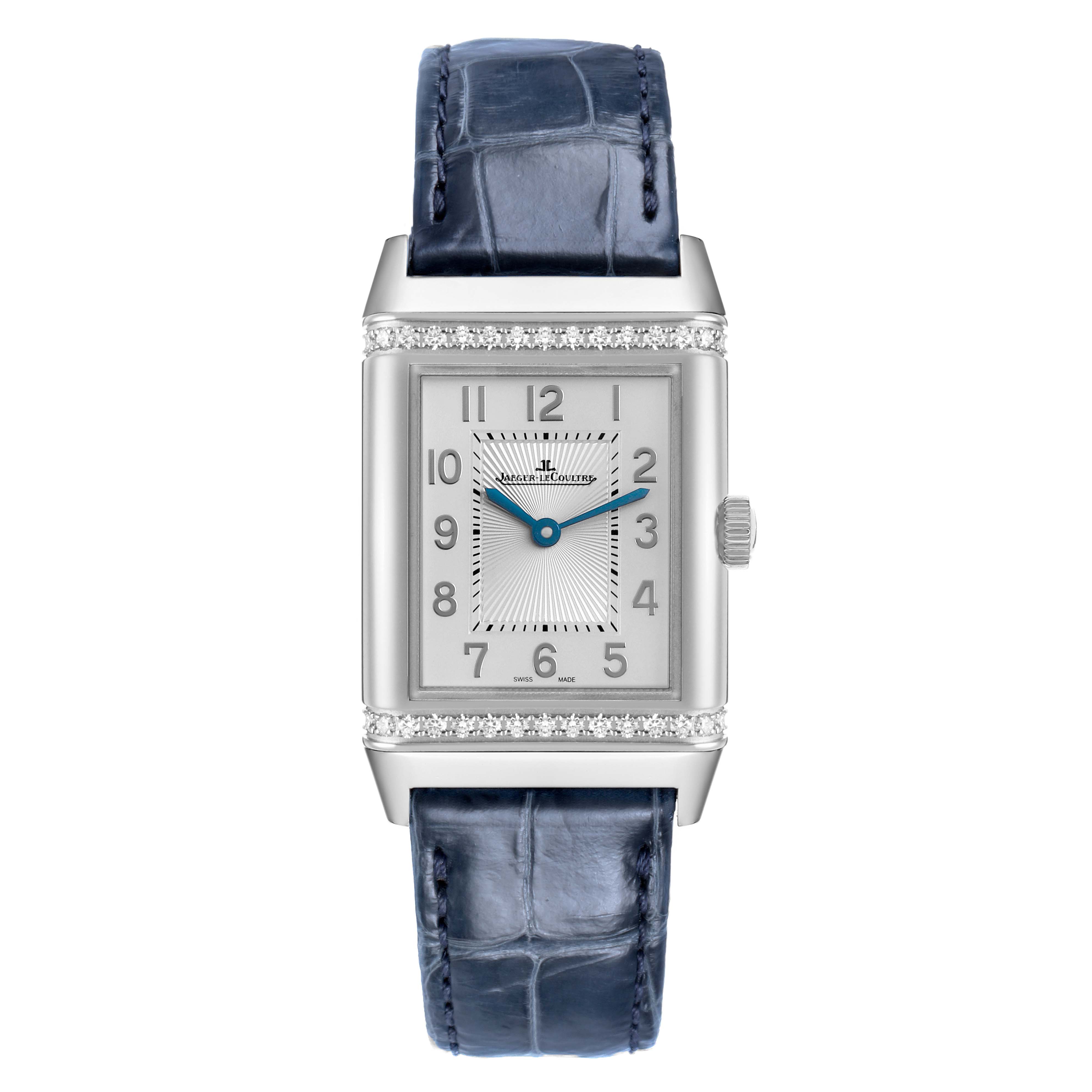 The Jaeger-LeCoultre Reverso watch is shown from a front angle, displaying the face, hour markers, hands, and strap.