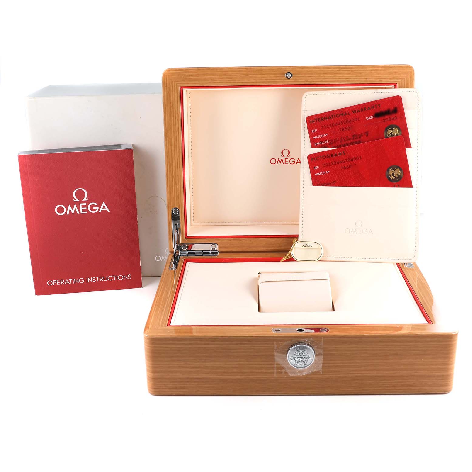 The image shows an Omega Seamaster 231.10.44.52.04.001 Men's Stainless Steel White Dial 231.10.44.52.04.001 Men's Stainless Steel White Dial watch box, instruction manual, warranty cards, and an authenticity card holder, photographed from the front.