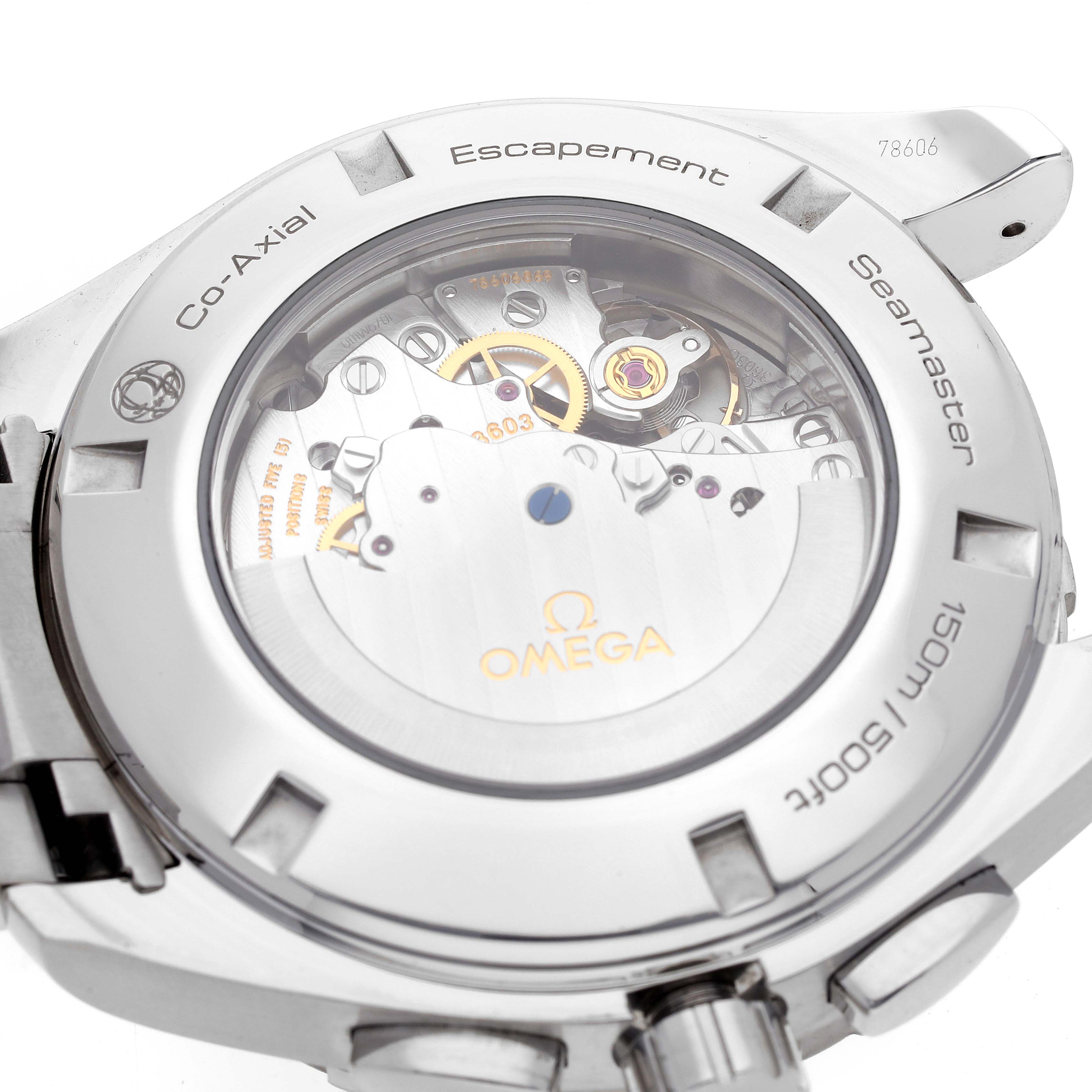The image shows the back view of an Omega Seamaster 231.10.44.52.04.001 Men's Stainless Steel White Dial 231.10.44.52.04.001 Men's Stainless Steel White Dial watch, highlighting its inner mechanical parts.