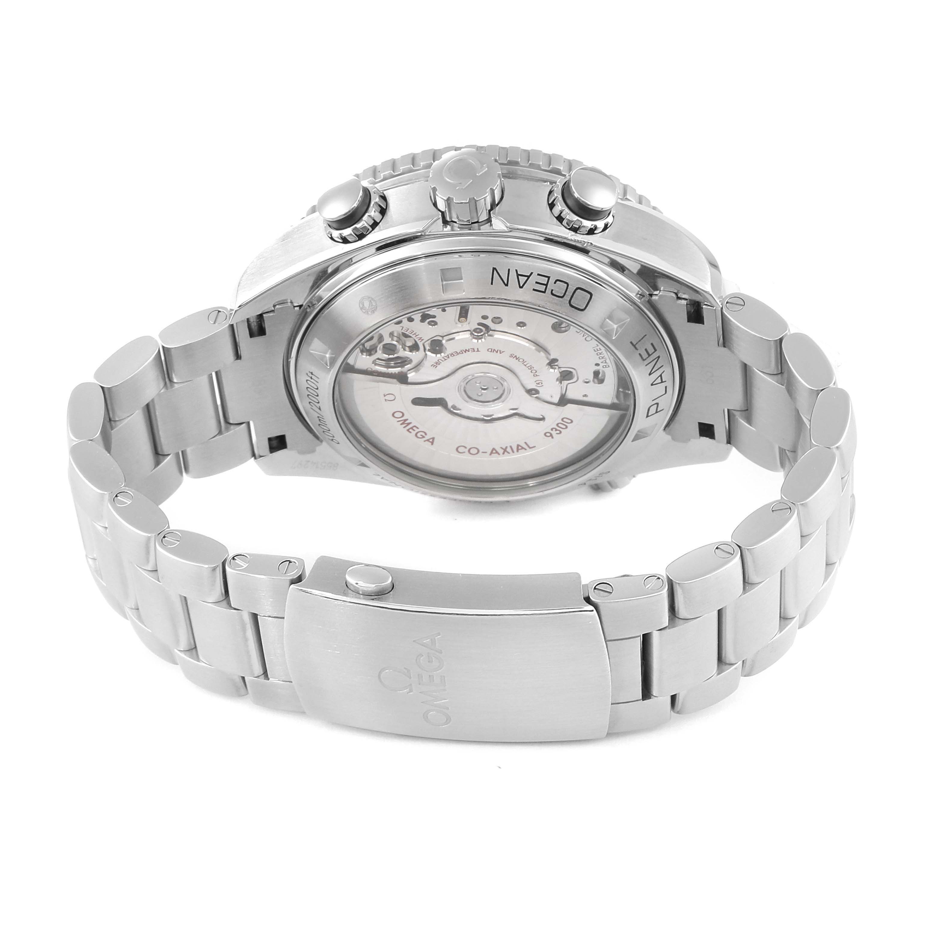 The image shows the back and bracelet of the Omega Planet Ocean 232.30.46.51.01.001 Men's Stainless Steel Black Dial 232.30.46.51.01.001 Men's Stainless Steel Black Dial watch, focusing on the transparent case back and clasp.