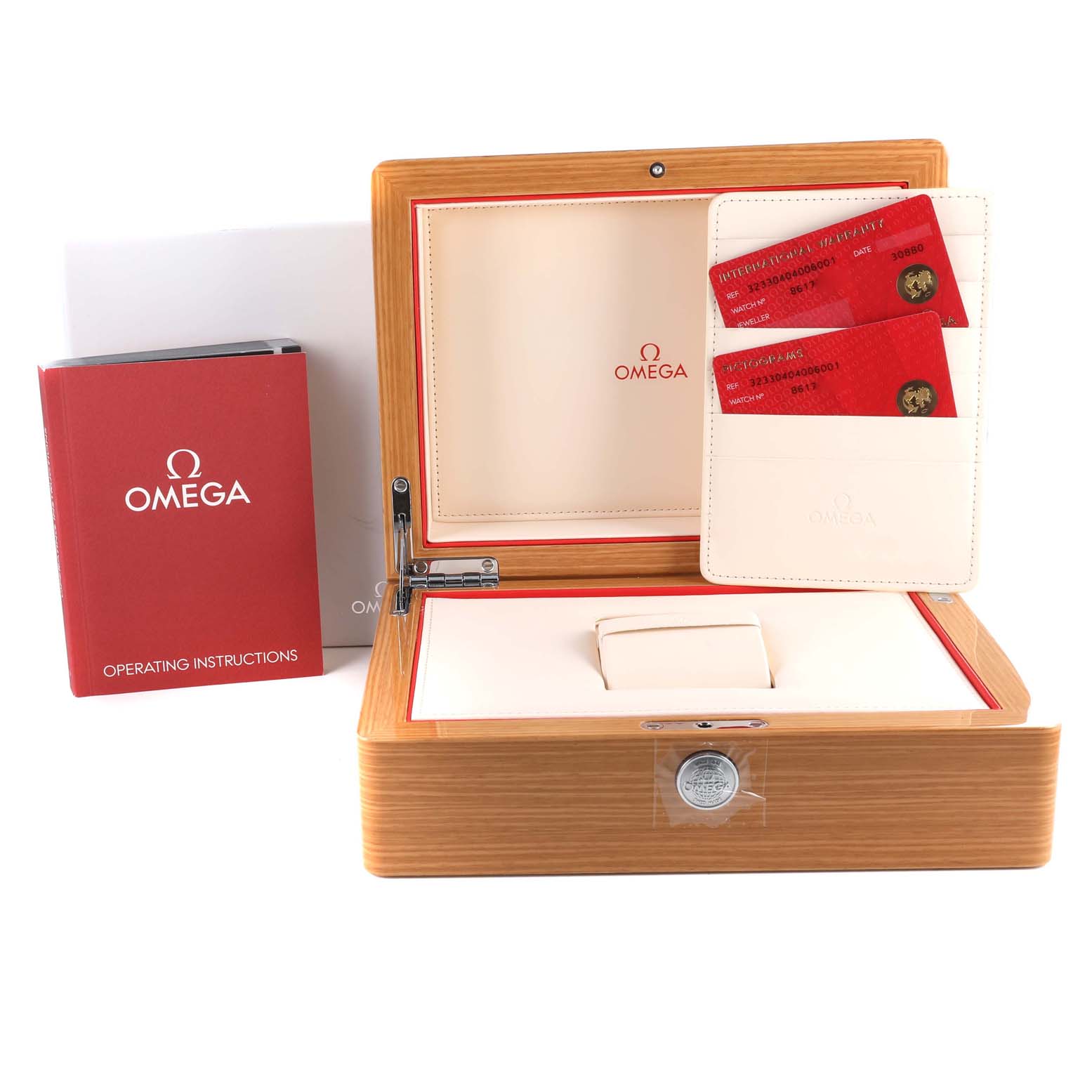 The image shows an Omega Speedmaster 323.30.40.40.06.001 Men
s Stainless Steel Grey Dial 323.30.40.40.06.001 Men
s Stainless Steel Grey Dial watch box, operating instructions, and Best Quality
ity cards arranged frontally.