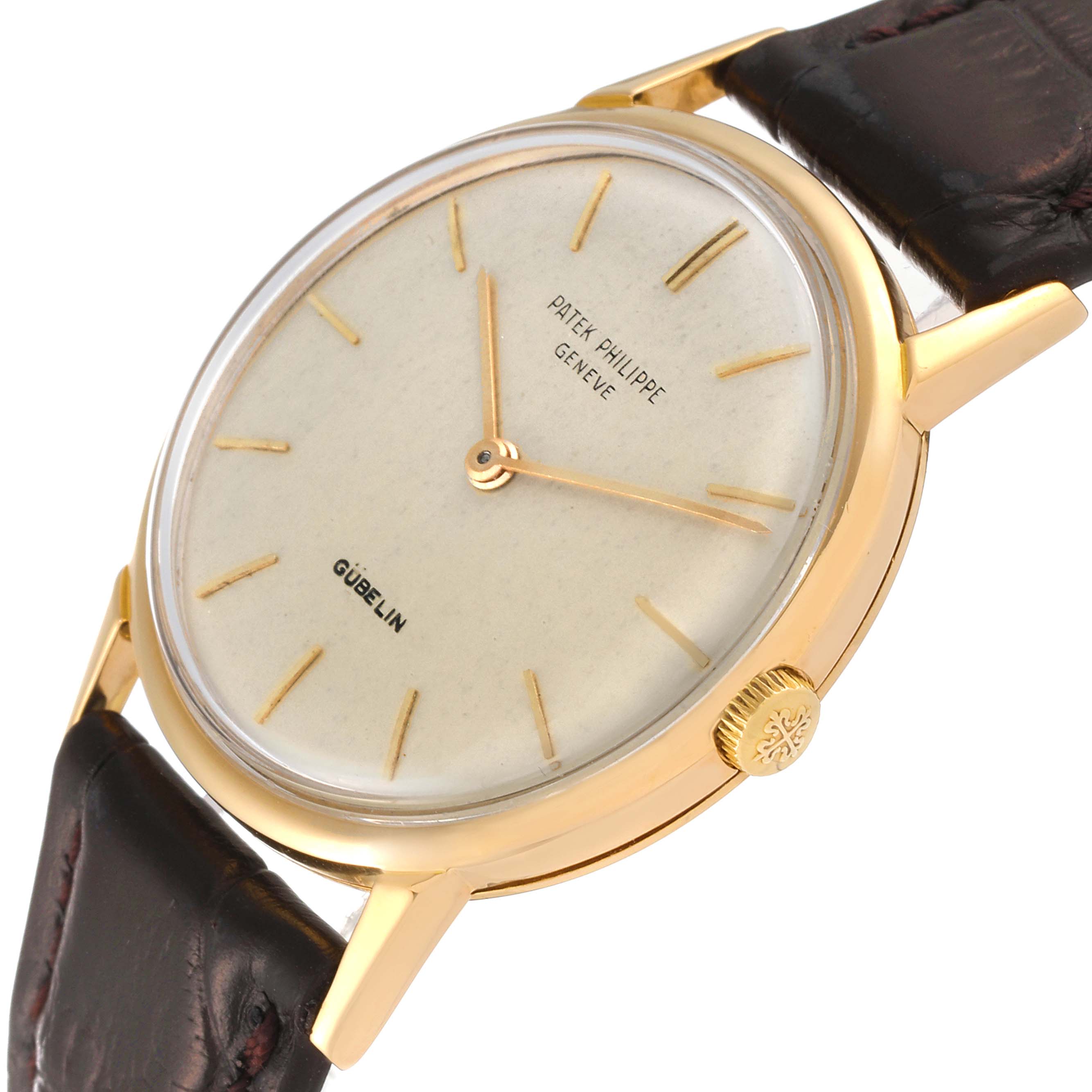 The image shows a Patek Philippe Calatrava 3416 Men's Yellow Gold Silver Dial 3416 Men's Yellow Gold Silver Dial watch from a slightly angled top view, highlighting its dial, bezel, crown, and leather strap.