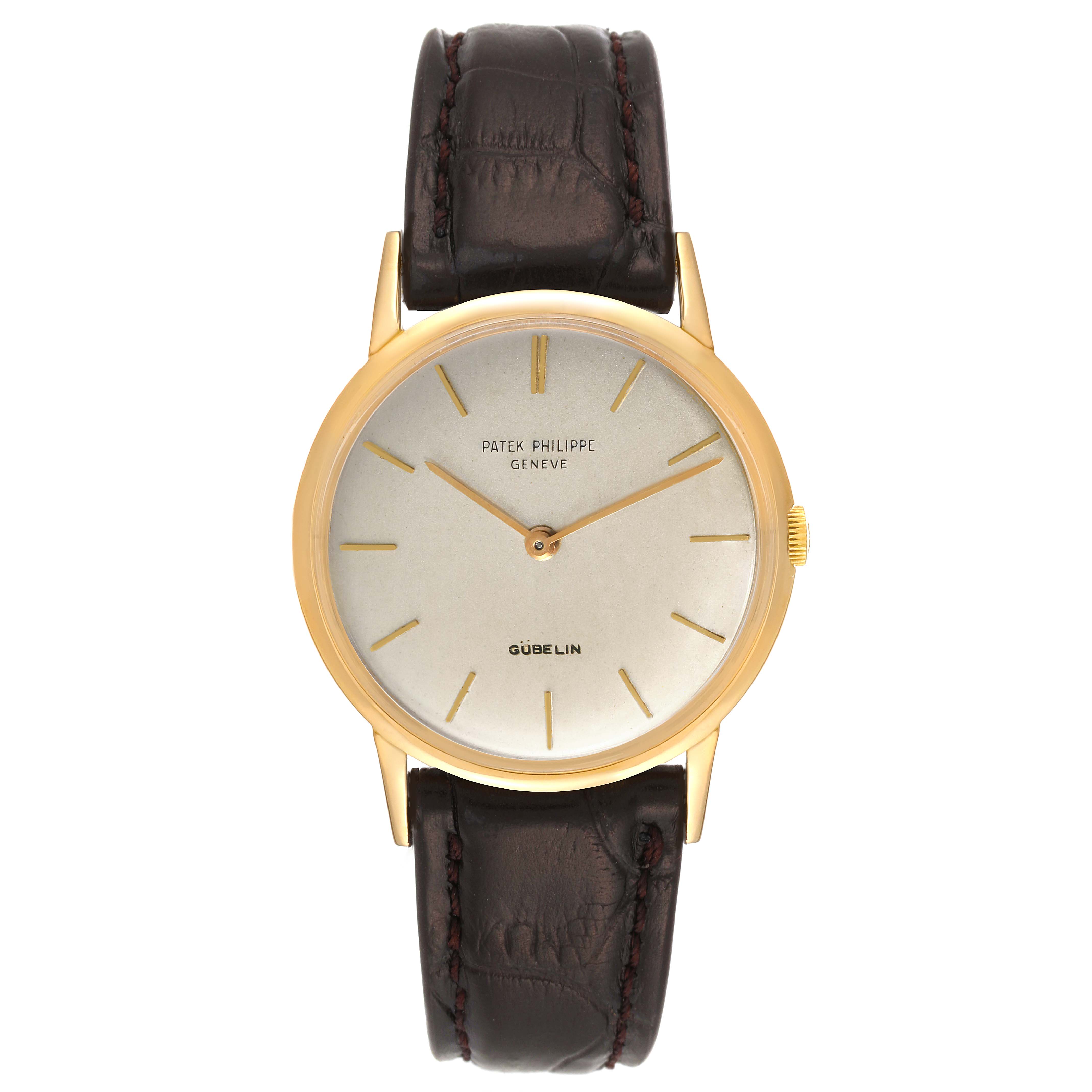 This image shows a frontal view of the Patek Philippe Calatrava 3416 Men's Yellow Gold Silver Dial 3416 Men's Yellow Gold Silver Dial watch, highlighting its dial, hands, and leather strap.