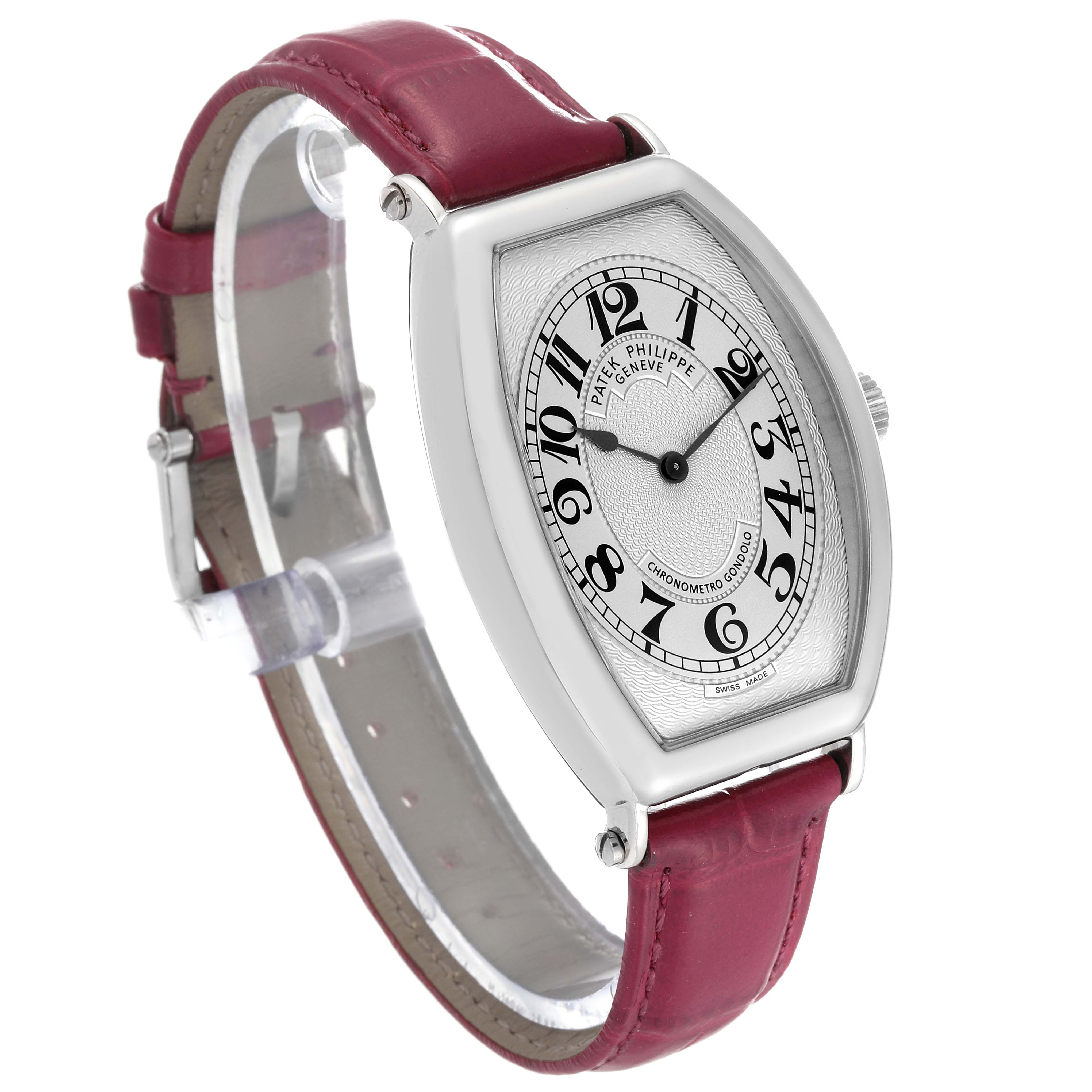 The image shows a Patek Philippe Gondolo 5098P Men's Platinum Silver Dial 5098P Men's Platinum Silver Dial watch at a slight angle, featuring its silver dial and pink leather strap.