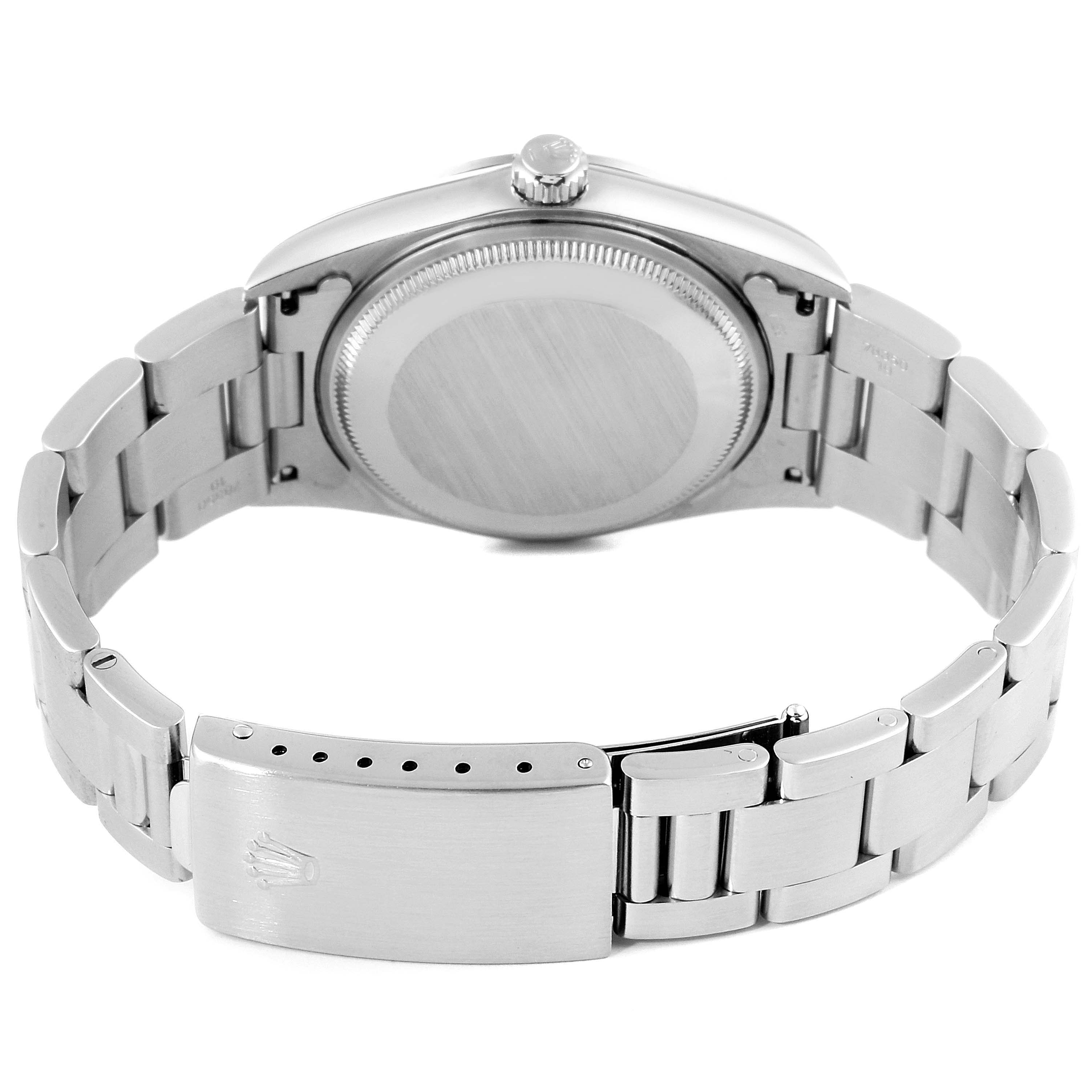 The Rolex Air-King 14000 Men's Stainless Steel Black Dial 14000 Men's Stainless Steel Black Dial watch is shown from the back, featuring its closed stainless steel bracelet and case back.