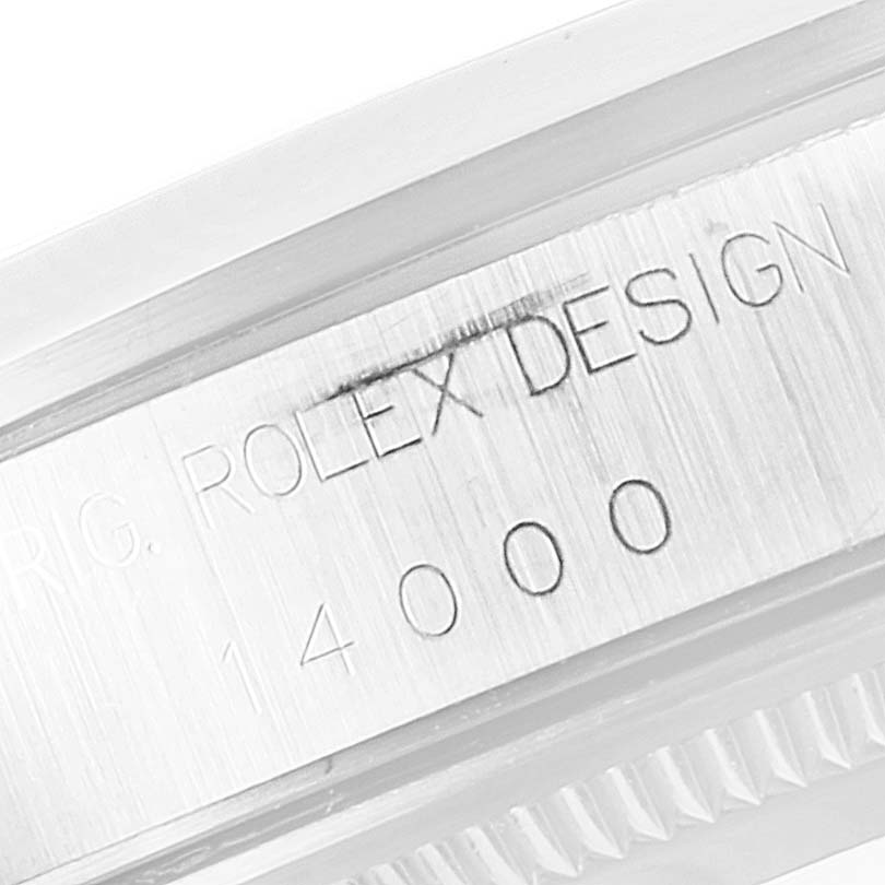 This image shows a close-up of the side engraving on the bezel of a Rolex Air-King 14000 Men's Stainless Steel Black Dial 14000 Men's Stainless Steel Black Dial model.