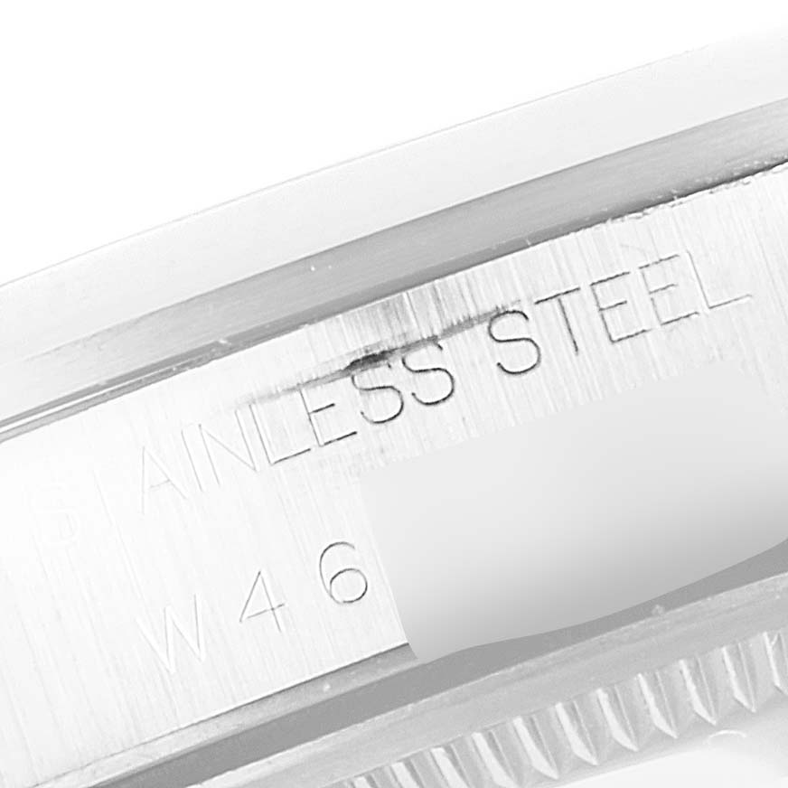 This image shows a close-up of the Rolex Air-King 14000 Men's Stainless Steel Black Dial 14000 Men's Stainless Steel Black Dial's stainless steel case side with part of the watch's serial number.