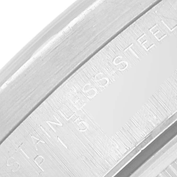 This image shows a close-up of the stainless-steel engraving on the case of a Rolex Air-King 14010 Men's Stainless Steel Black Dial 14010 Men's Stainless Steel Black Dial watch.