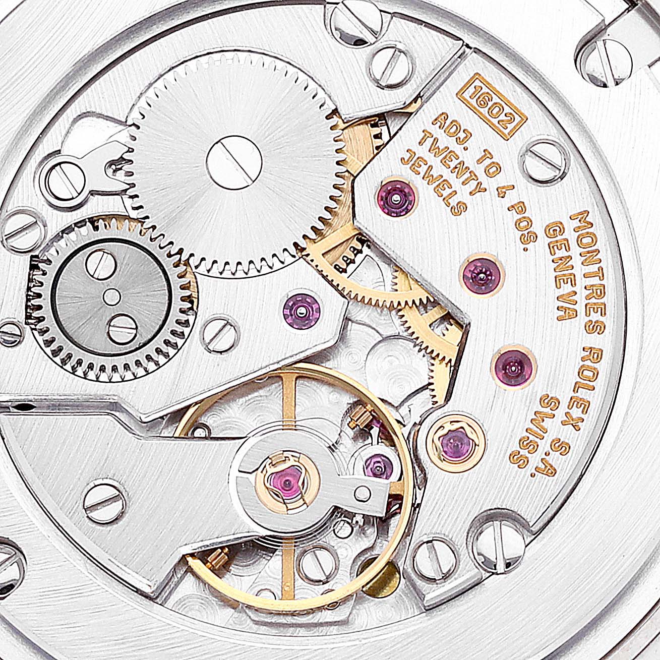 This is a close-up of the movement components of a Rolex Cellini 5115 Men's White Gold Black Dial 5115 Men's White Gold Black Dial watch, showing gears, jewels, and the balance wheel.
