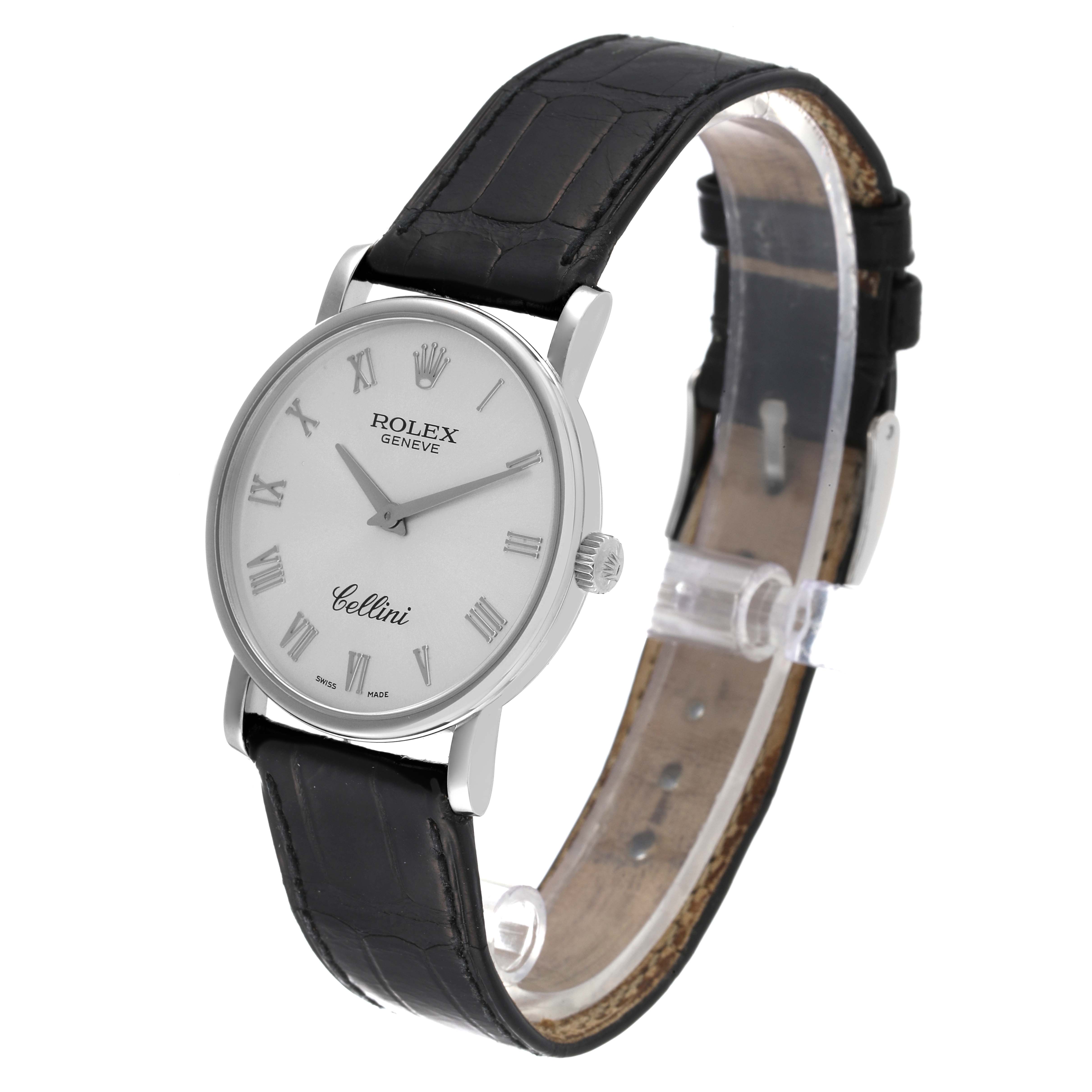 The image shows the Rolex Cellini 5115 Men's White Gold Silver Dial 5115 Men's White Gold Silver Dial watch from a front-left angle, highlighting its white dial with Roman numerals and black leather strap.