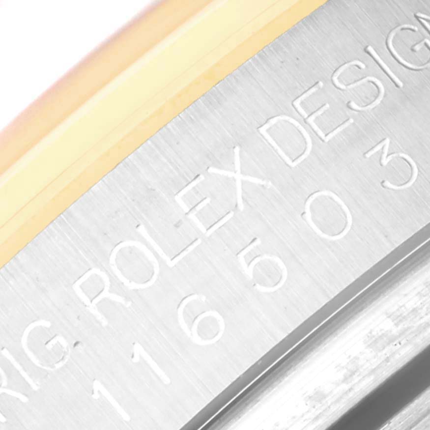 The image shows a close-up of the serial number engraving on the side of a Rolex Daytona 116503 Men's Steel and Gold (two tone) Champagne Dial 116503 Men's Steel and Gold (two tone) Champagne Dial watch.