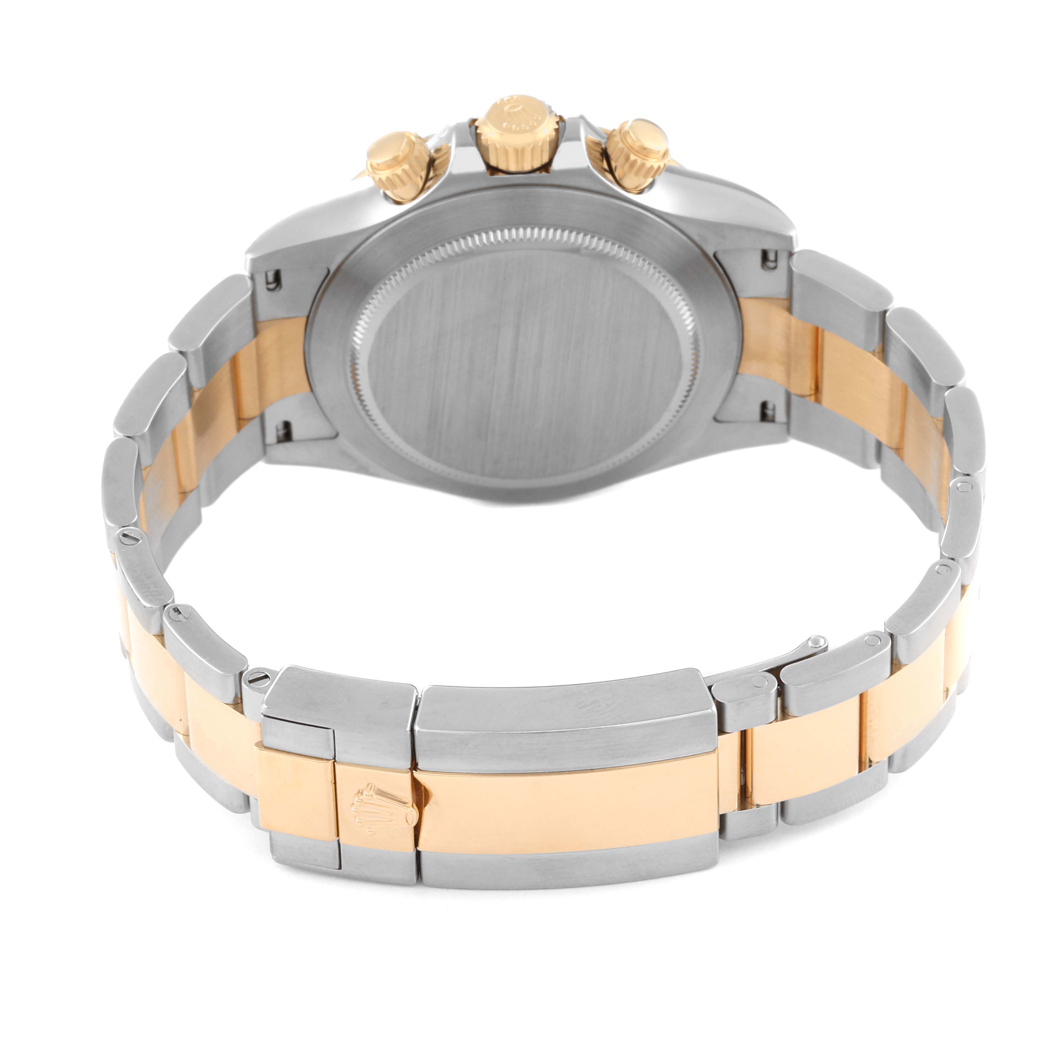 This image shows the back side of a Rolex Daytona 116503 Men's Steel and Gold (two tone) Champagne Dial 116503 Men's Steel and Gold (two tone) Champagne Dial watch, highlighting the clasp, bracelet, and caseback.