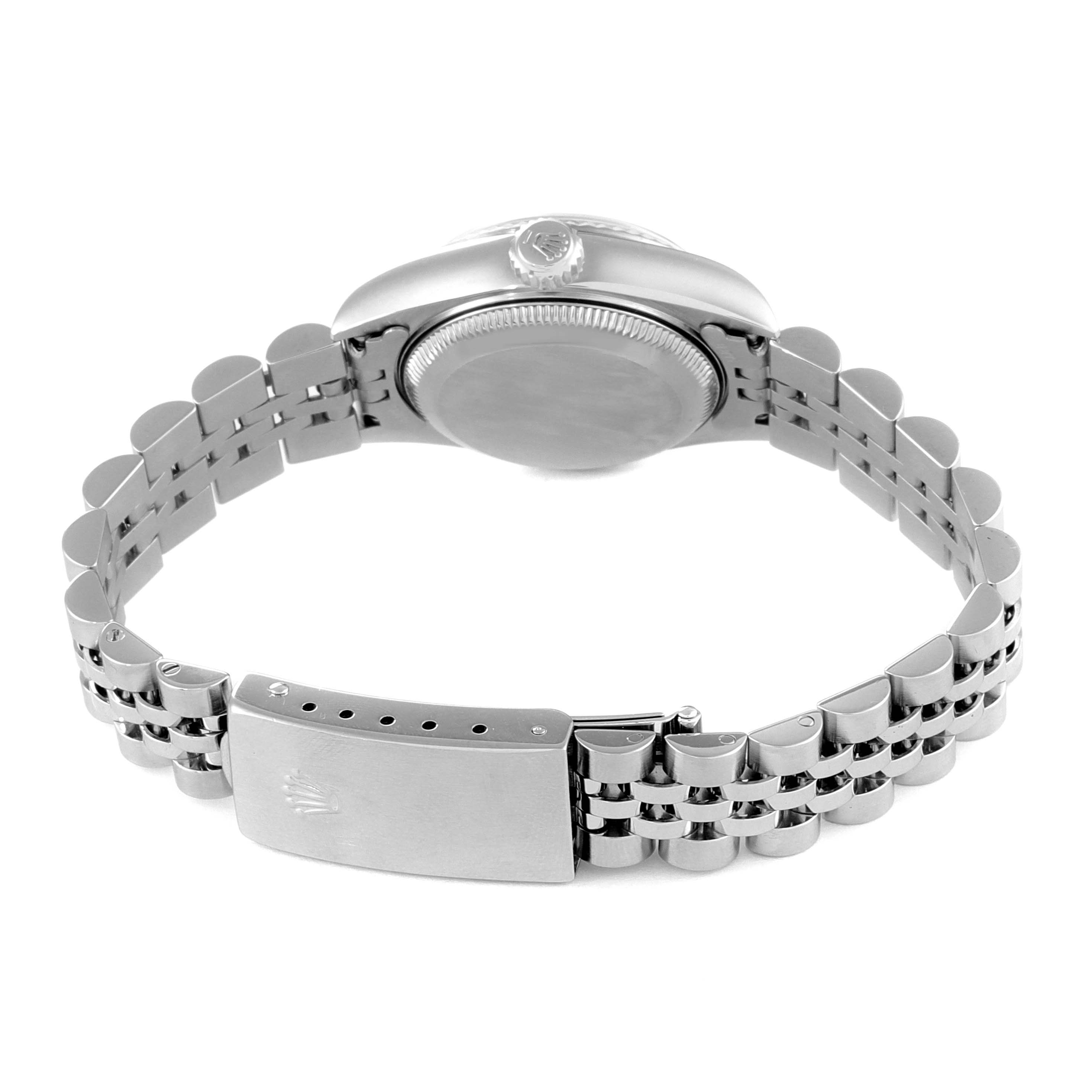 This image shows the underside of a Rolex Datejust 79174 Women's Stainless Steel Pink Dial 79174 Women's Stainless Steel Pink Dial watch, focusing on the case back and metal bracelet with the clasp.