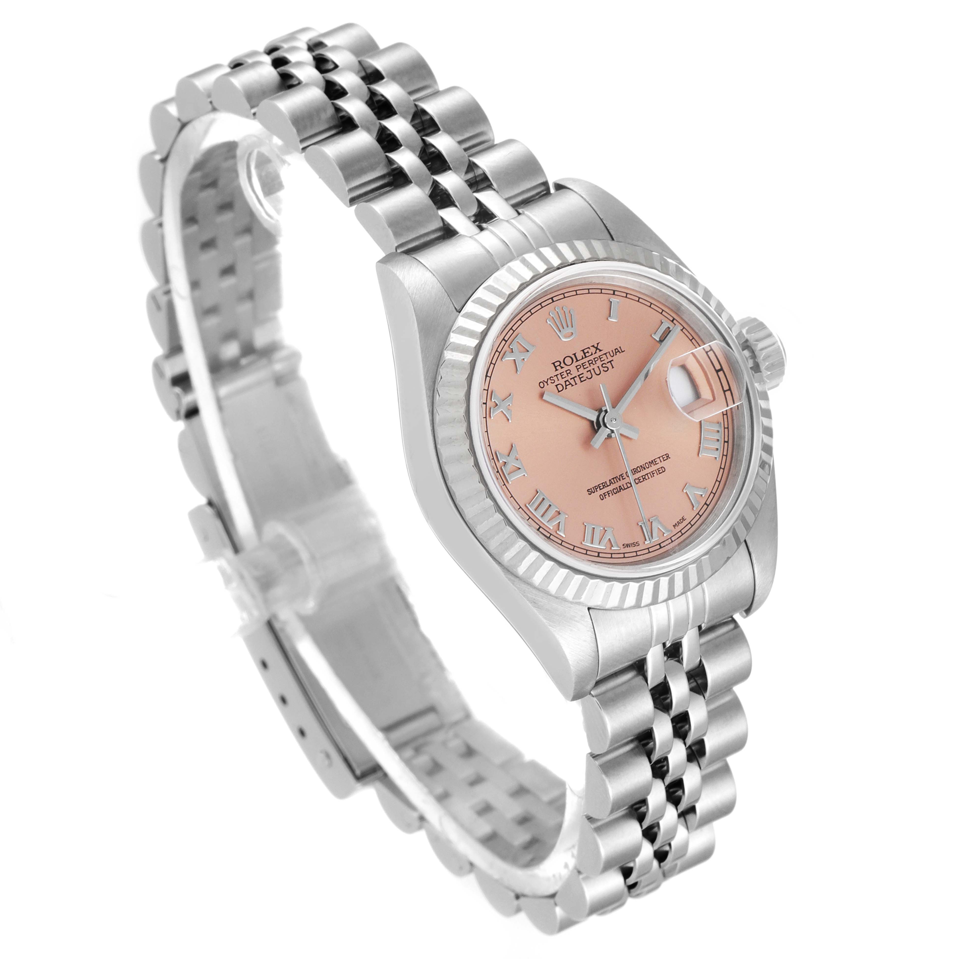 The Rolex Datejust 79174 Women's Stainless Steel Pink Dial 79174 Women's Stainless Steel Pink Dial watch is shown at an angle revealing the bezel, dial, bracelet, and crown.