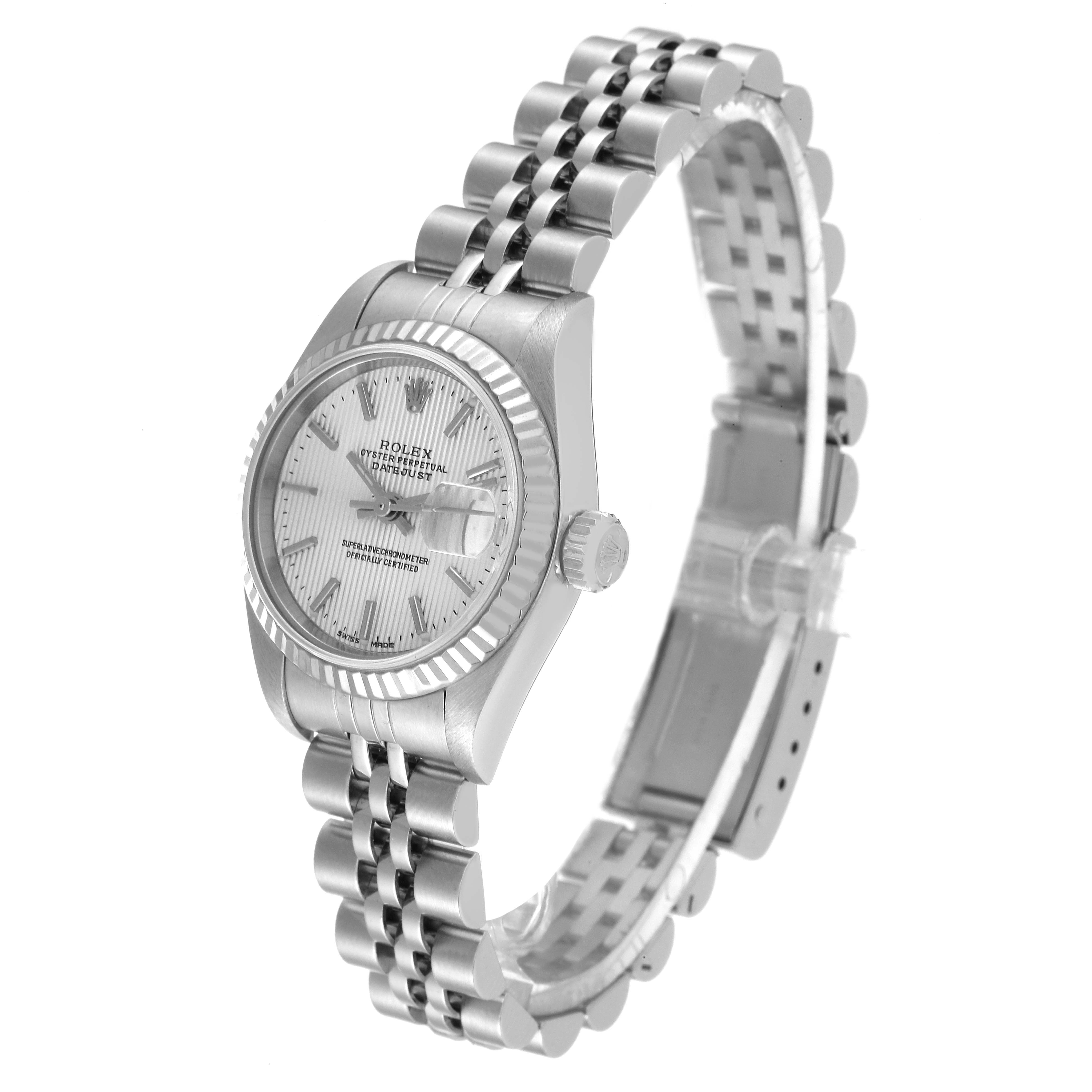 The Rolex Datejust 79174 Women's Stainless Steel Silver Dial 79174 Women's Stainless Steel Silver Dial watch is shown at an angled side view, displaying the watch face, crown, and partially unfastened bracelet.