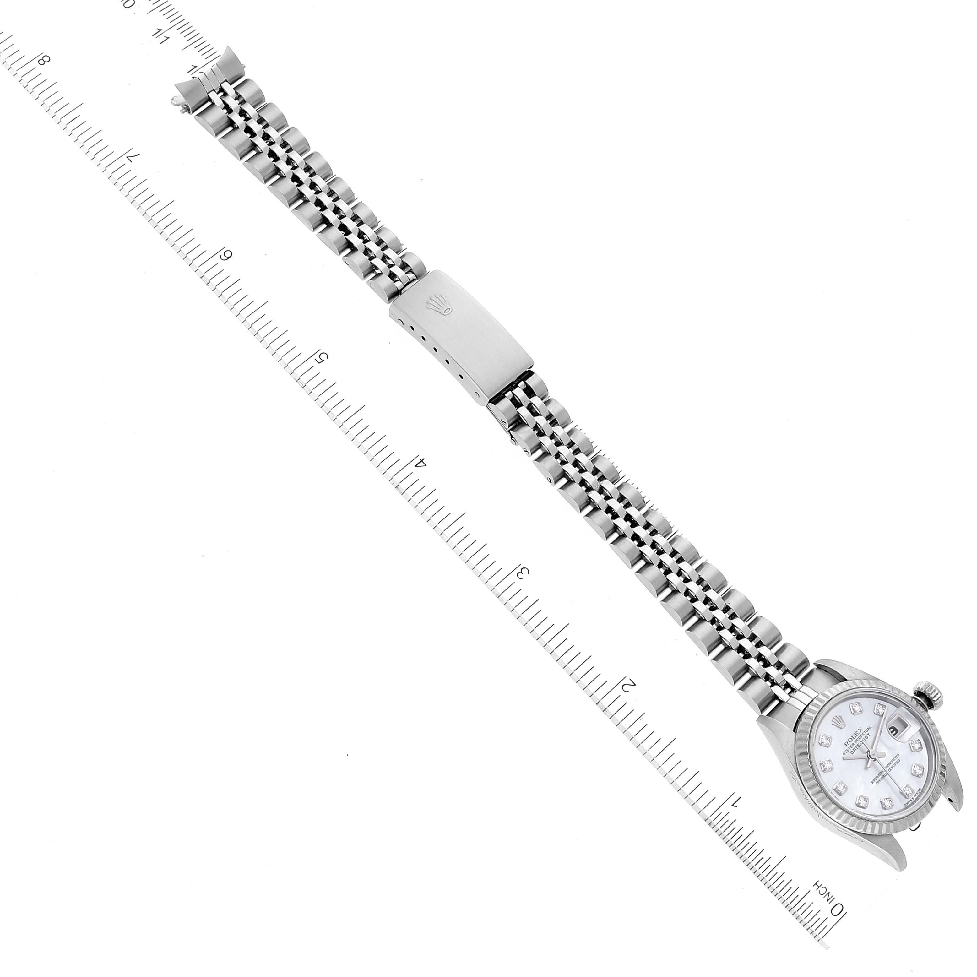 This image shows a top-down view of a Rolex Datejust 79174 Women's Stainless Steel Mother of Pearl Dial 79174 Women's Stainless Steel Mother of Pearl Dial watch, including the face, bracelet, and clasp.