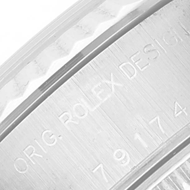 This image shows a close-up of the engraved case back of a Rolex Datejust 79174 Women's Stainless Steel Mother of Pearl Dial 79174 Women's Stainless Steel Mother of Pearl Dial watch.