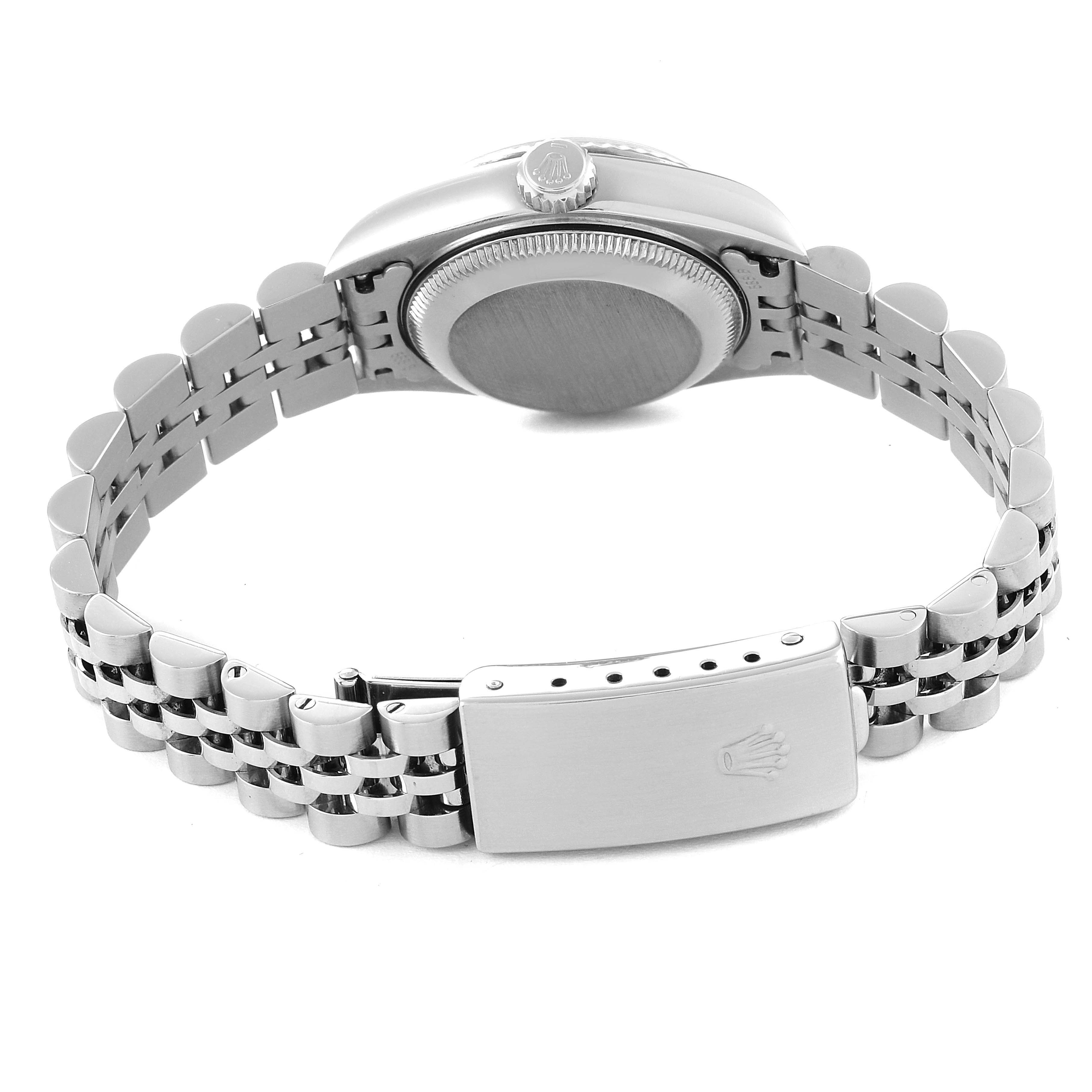 The image shows the back view of a Rolex Datejust 79174 Women's Stainless Steel Mother of Pearl Dial 79174 Women's Stainless Steel Mother of Pearl Dial watch, highlighting the clasp, case, and bracelet.