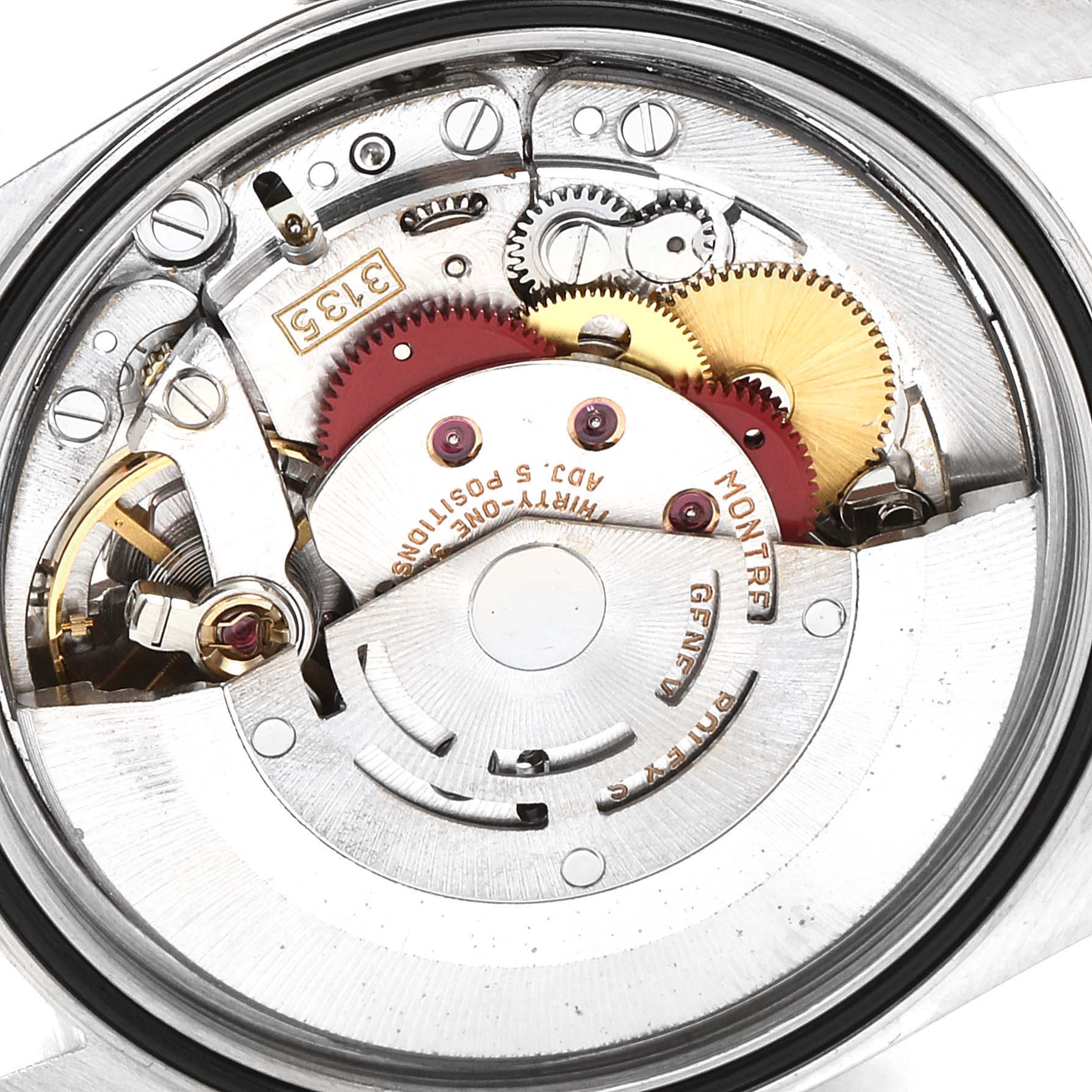 This image shows the internal mechanical movement of the Rolex Datejust 16220 Men's Stainless Steel Beige Dial 16220 Men's Stainless Steel Beige Dial watch from a straight-on angle.