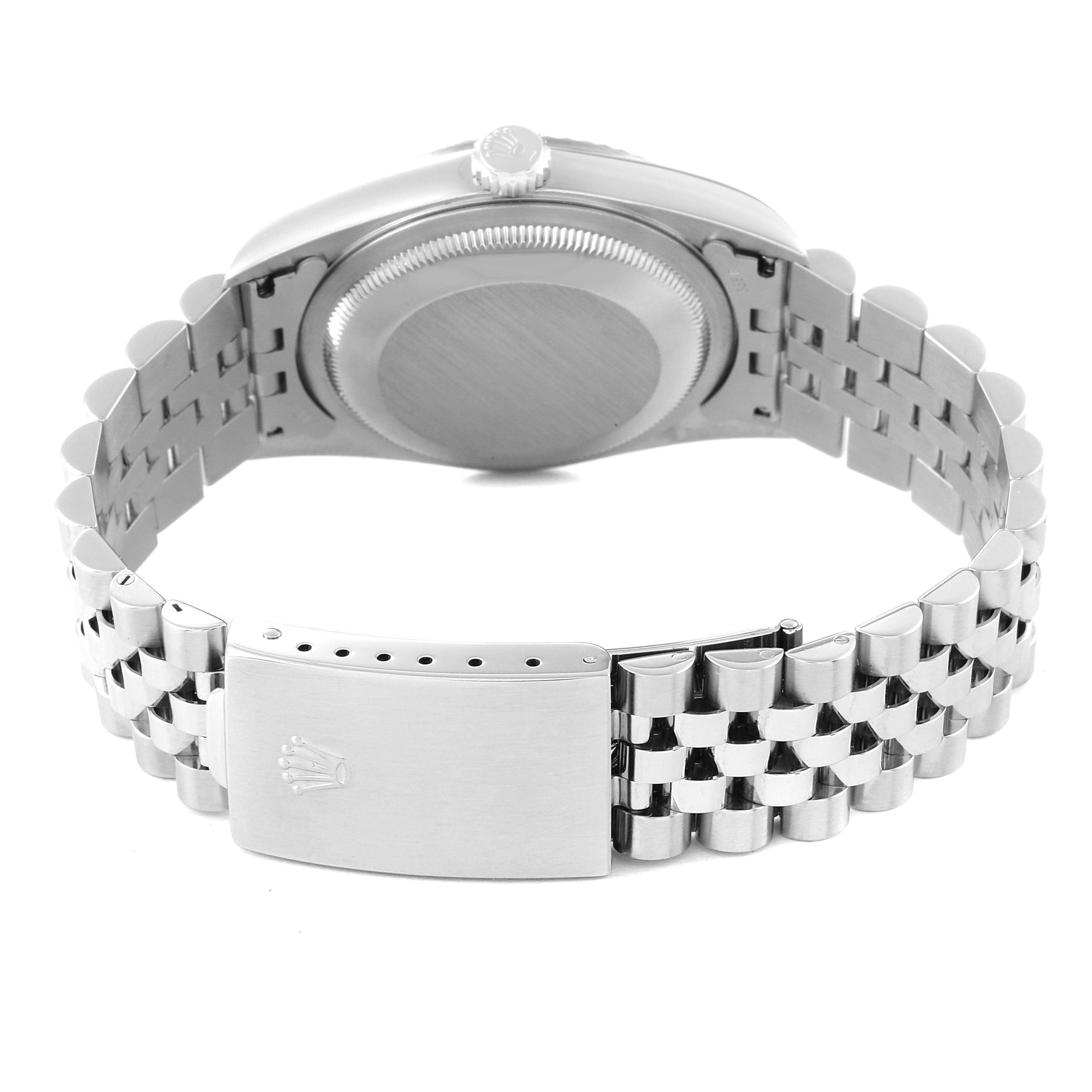 The image shows the back view of a Rolex Datejust 16234 Men's Stainless Steel Silver Dial 16234 Men's Stainless Steel Silver Dial watch, highlighting the case back, crown, and bracelet with a clasp.