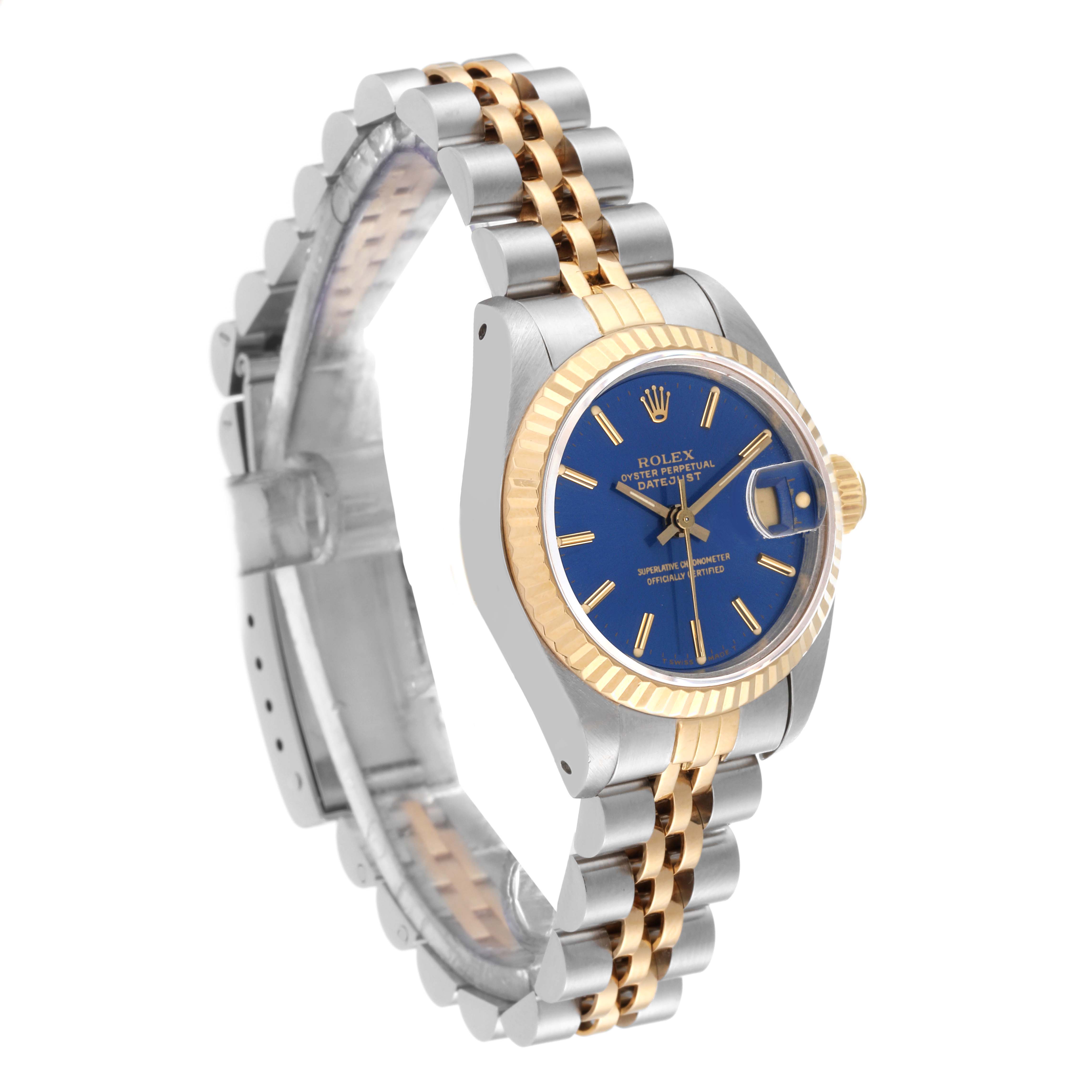 The Rolex Datejust 69173 Women's Steel and Gold (two tone) Blue Dial 69173 Women's Steel and Gold (two tone) Blue Dial watch is shown at a three-quarter view, displaying its blue dial, gold fluted bezel, and two-tone bracelet.