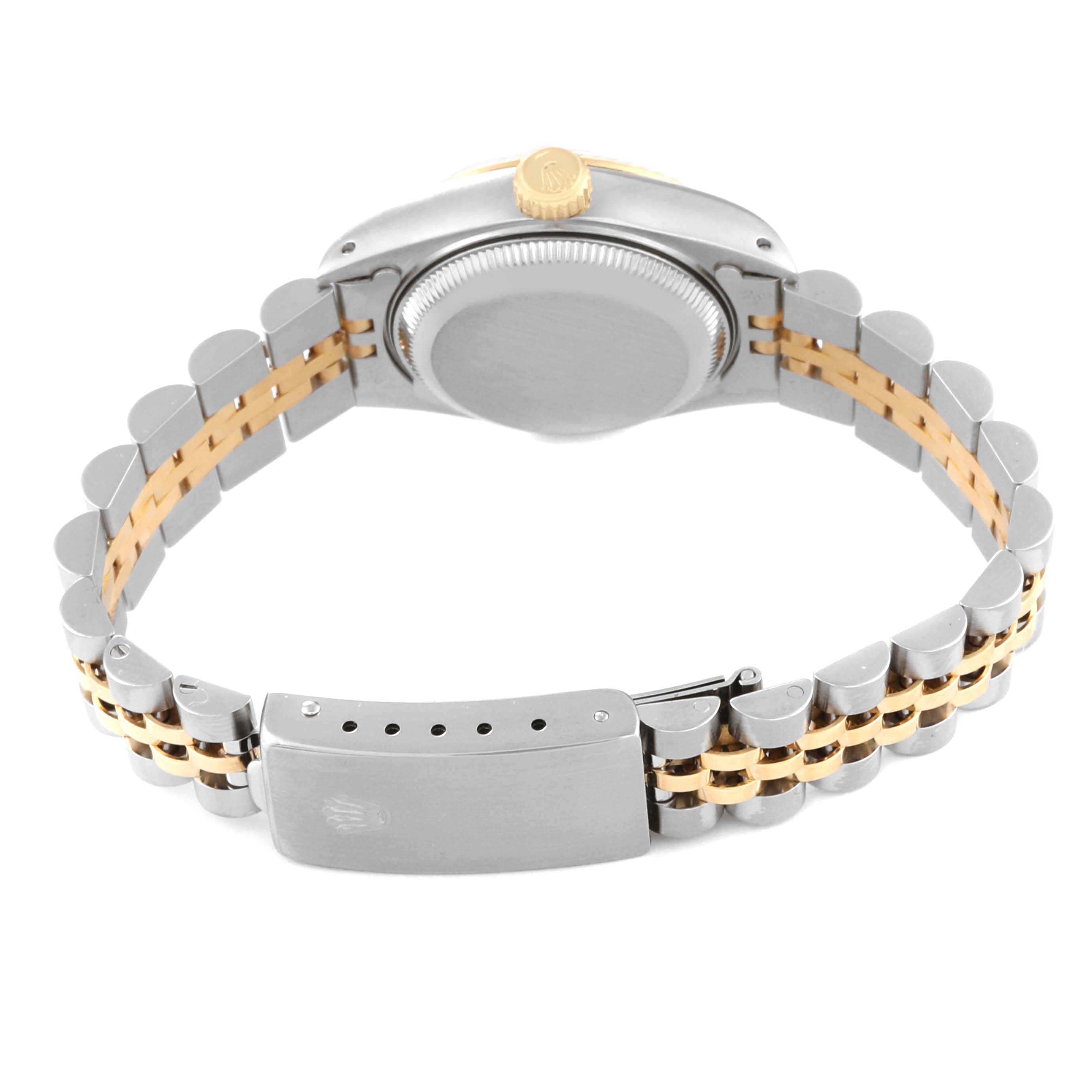 This image shows the back of a Rolex Datejust 69173 Women's Steel and Gold (two tone) Champagne Dial 69173 Women's Steel and Gold (two tone) Champagne Dial watch, highlighting its case, crown, and two-tone bracelet with the clasp open.