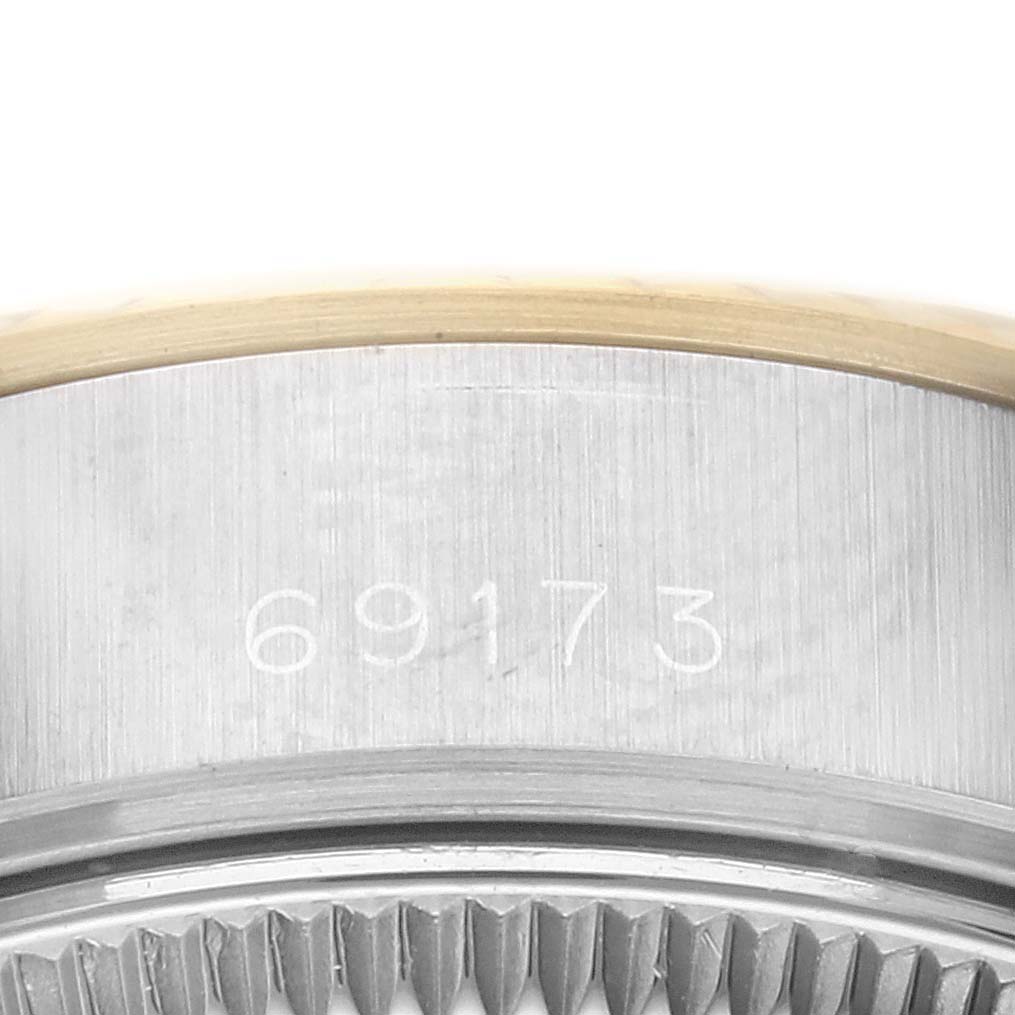 This image shows a close-up of the side of a Rolex Datejust 69173G Women's Steel and Gold (two tone) Champagne Dial 69173G Women's Steel and Gold (two tone) Champagne Dial watch, highlighting the model number 69173.