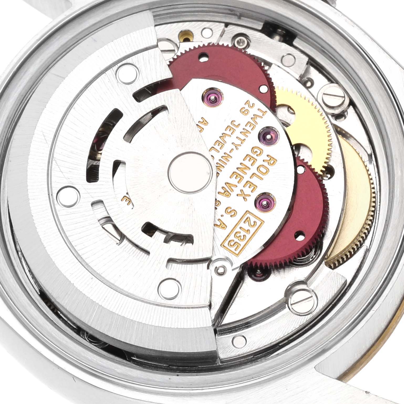 The image shows the Rolex Datejust 69173G Women's Steel and Gold (two tone) Champagne Dial 69173G Women's Steel and Gold (two tone) Champagne Dial model watch from a rear angle, highlighting its intricate internal movement components.